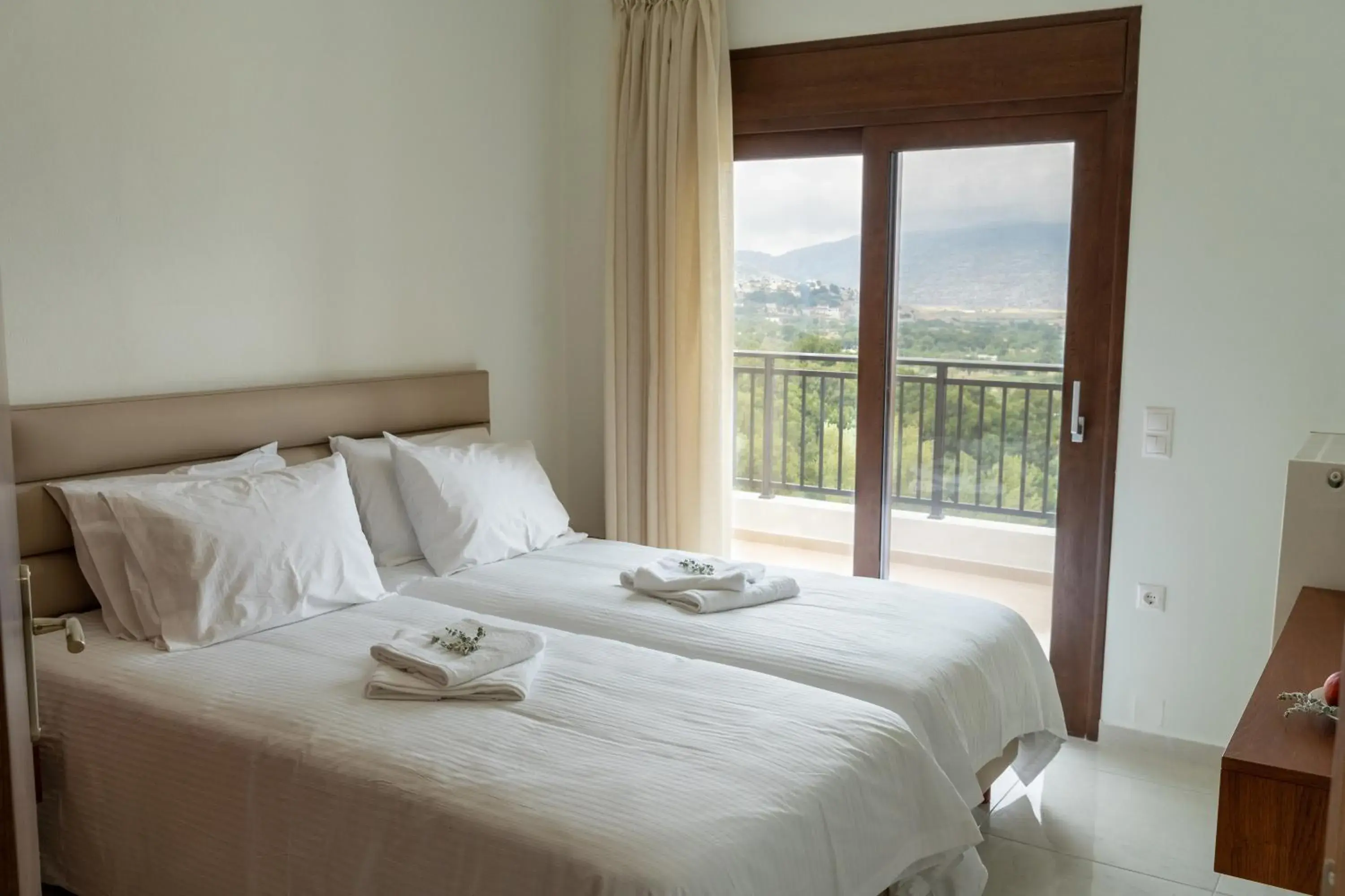 Twin Room with Balcony in Dictamus Homes Twin Room with Balcony in Dictamus Homes