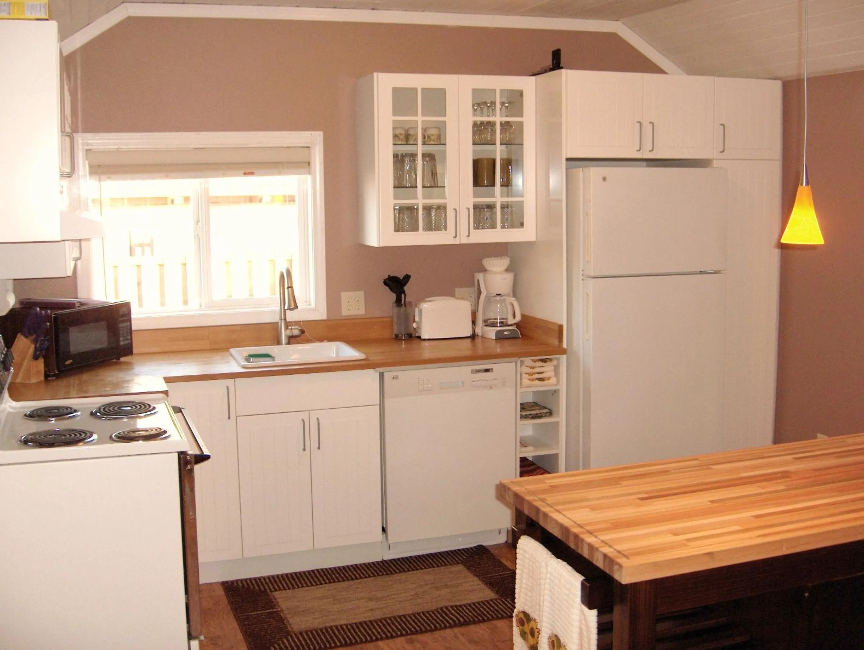 Kitchen or kitchenette in Historic 1920s Cabin