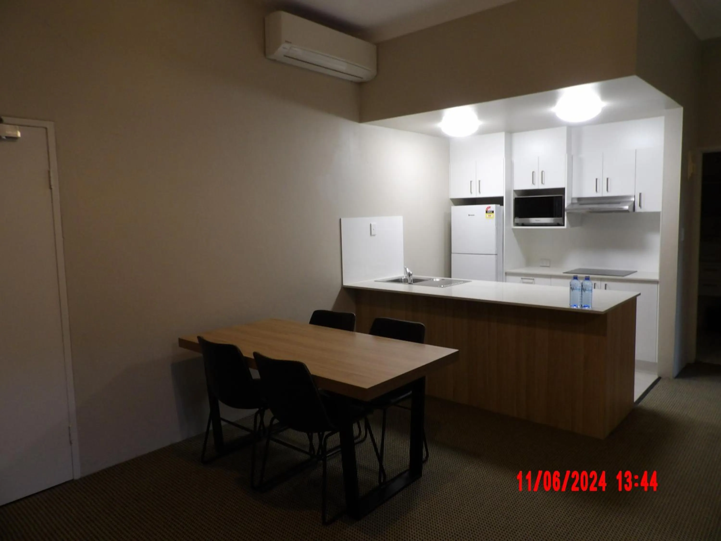 Kitchen or kitchenette in The Belmore Apartments Hotel