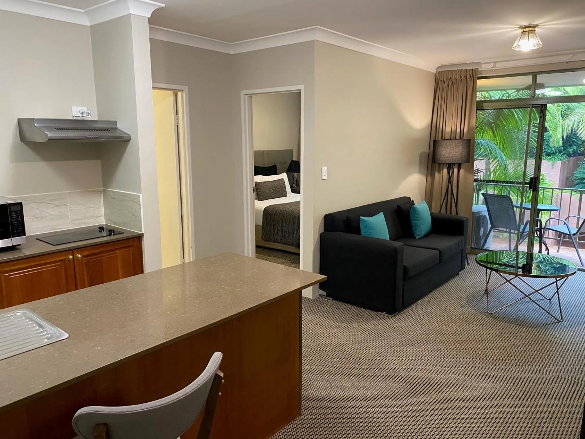 Kitchen or kitchenette in The Belmore Apartments Hotel