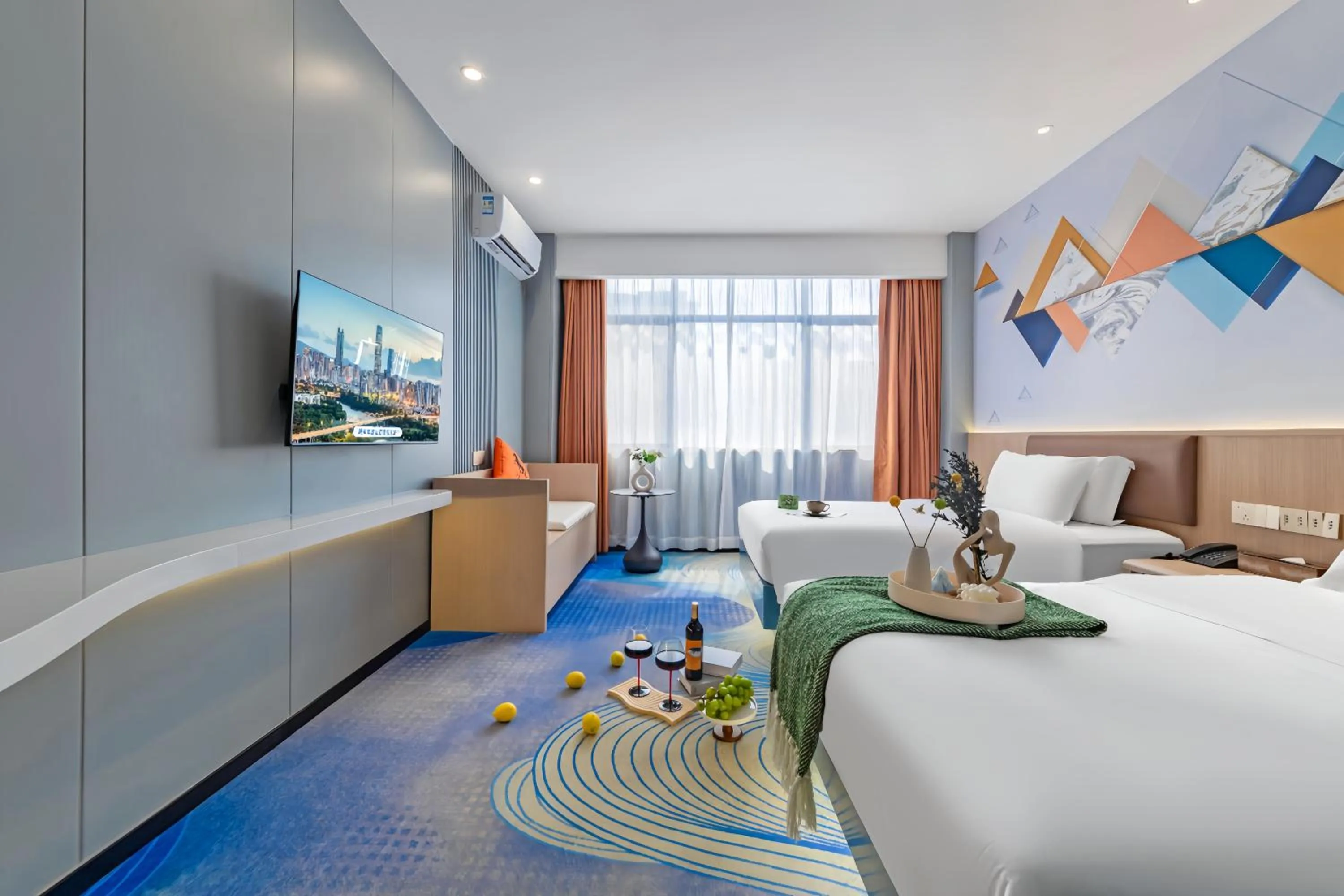 Communal lounge/ TV room, Bed in Xinghe Yuezhi S Hotel to Guangzhou Yuexiu Park Railway Station Subway station