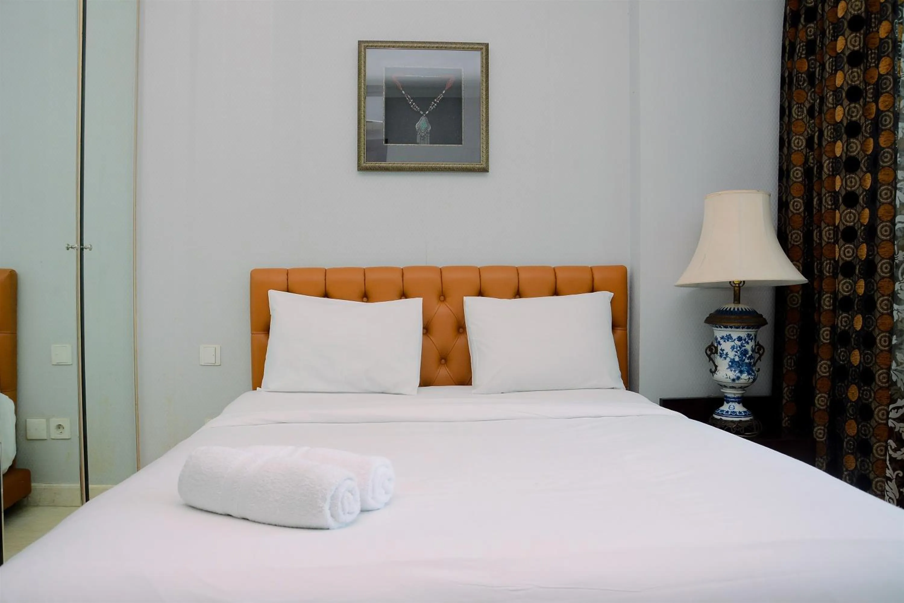 Bed in Modern and Luxurious 2BR Essence Dharmawangsa Apartment By Travelio