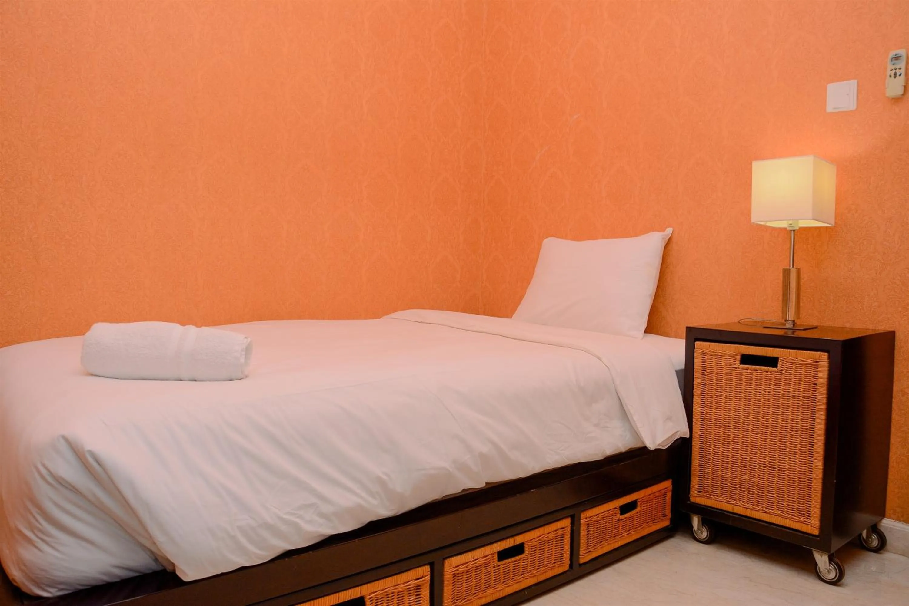 Bed in Modern and Luxurious 2BR Essence Dharmawangsa Apartment By Travelio