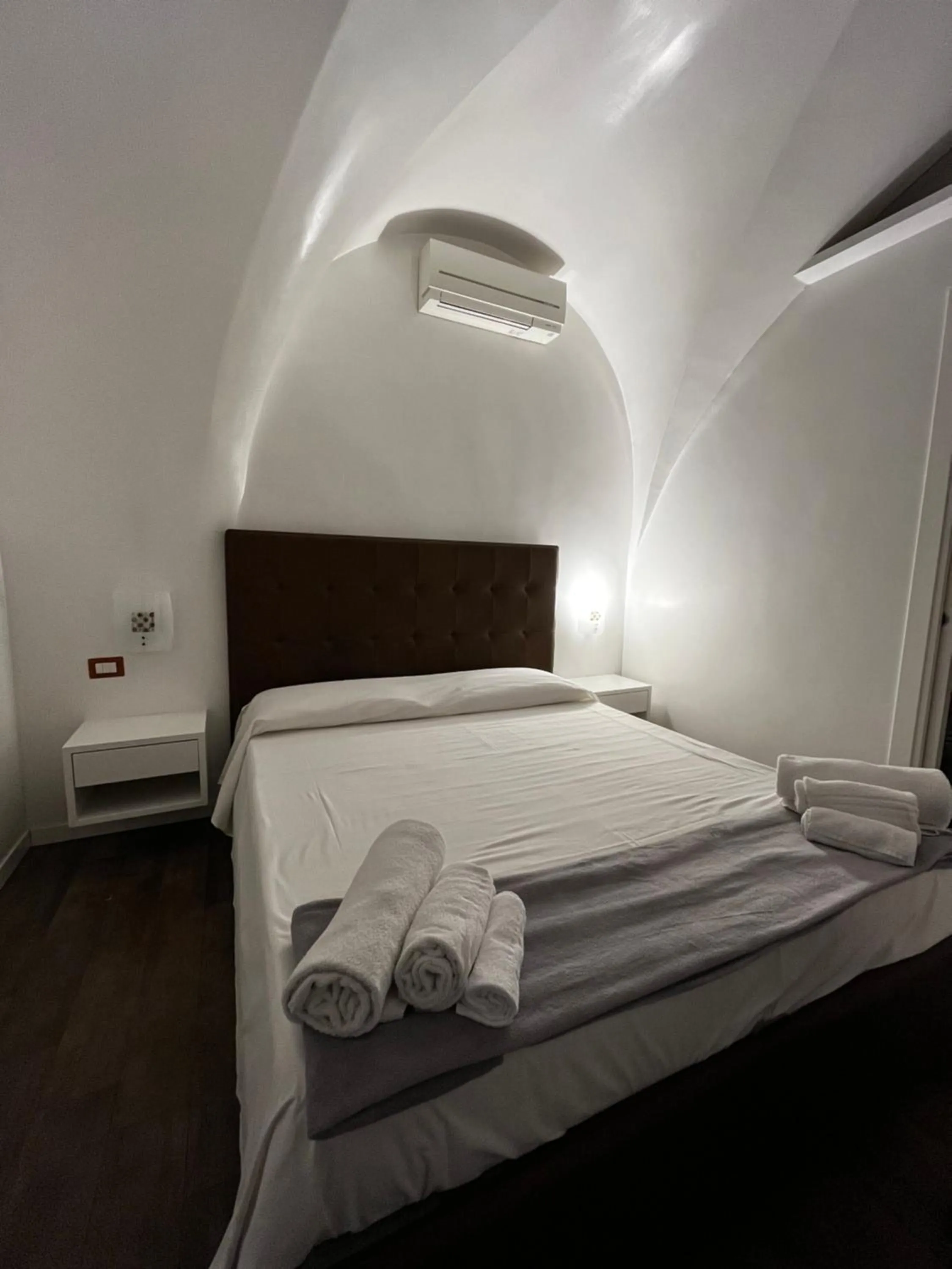 Bed in Casa Giorgia luxury apartment