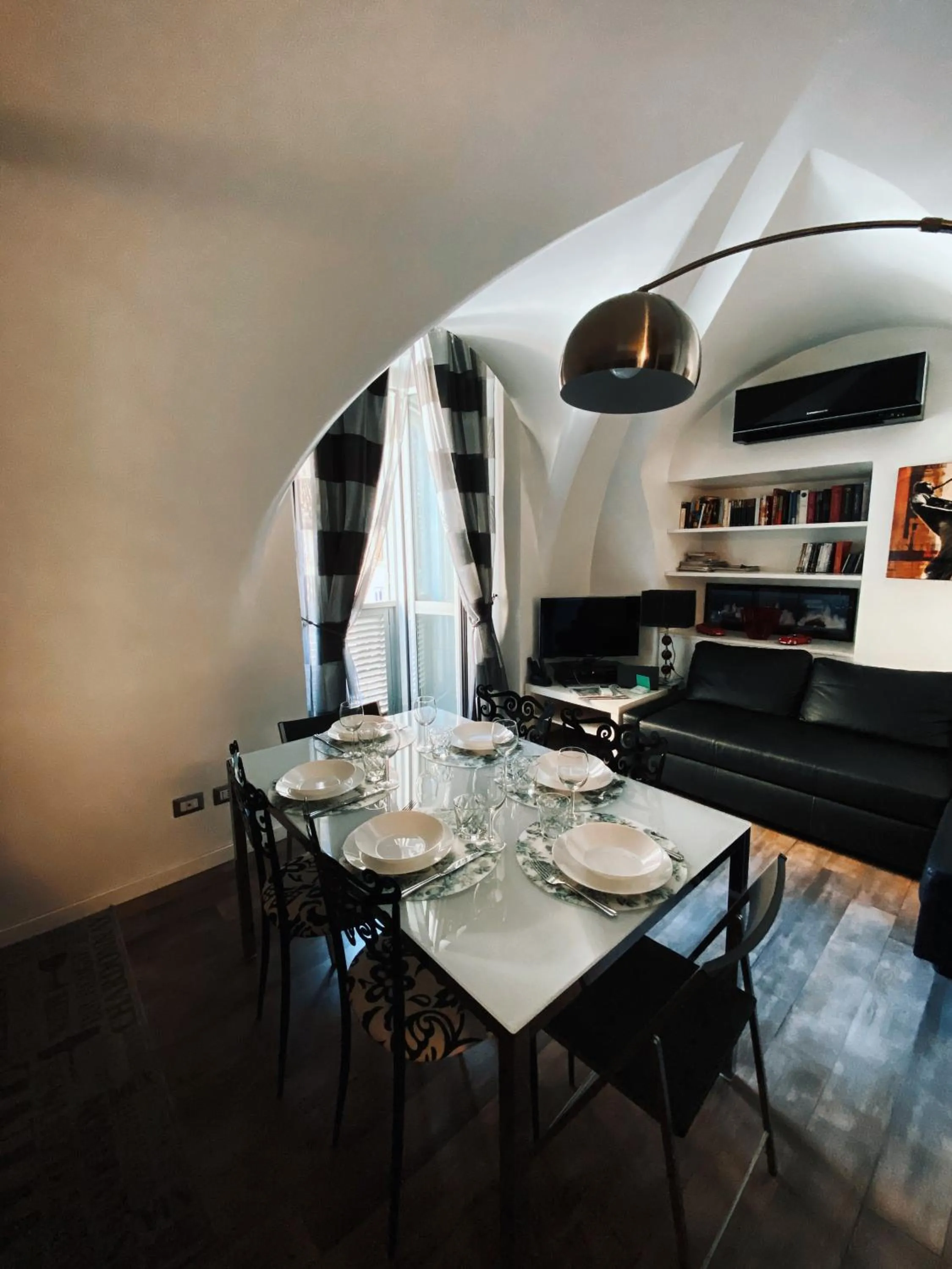 Communal lounge/ TV room in Casa Giorgia luxury apartment