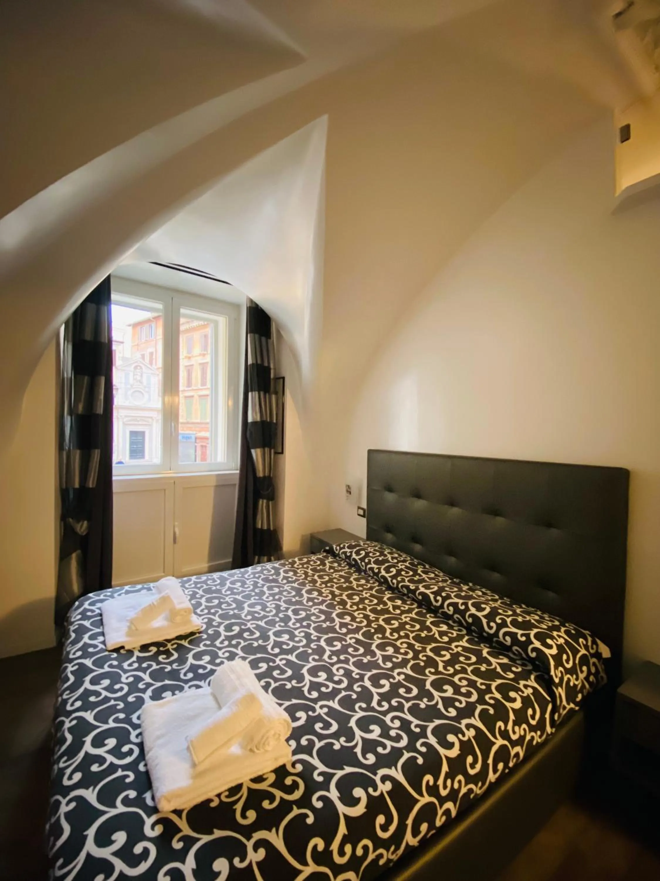 Bed in Casa Giorgia luxury apartment