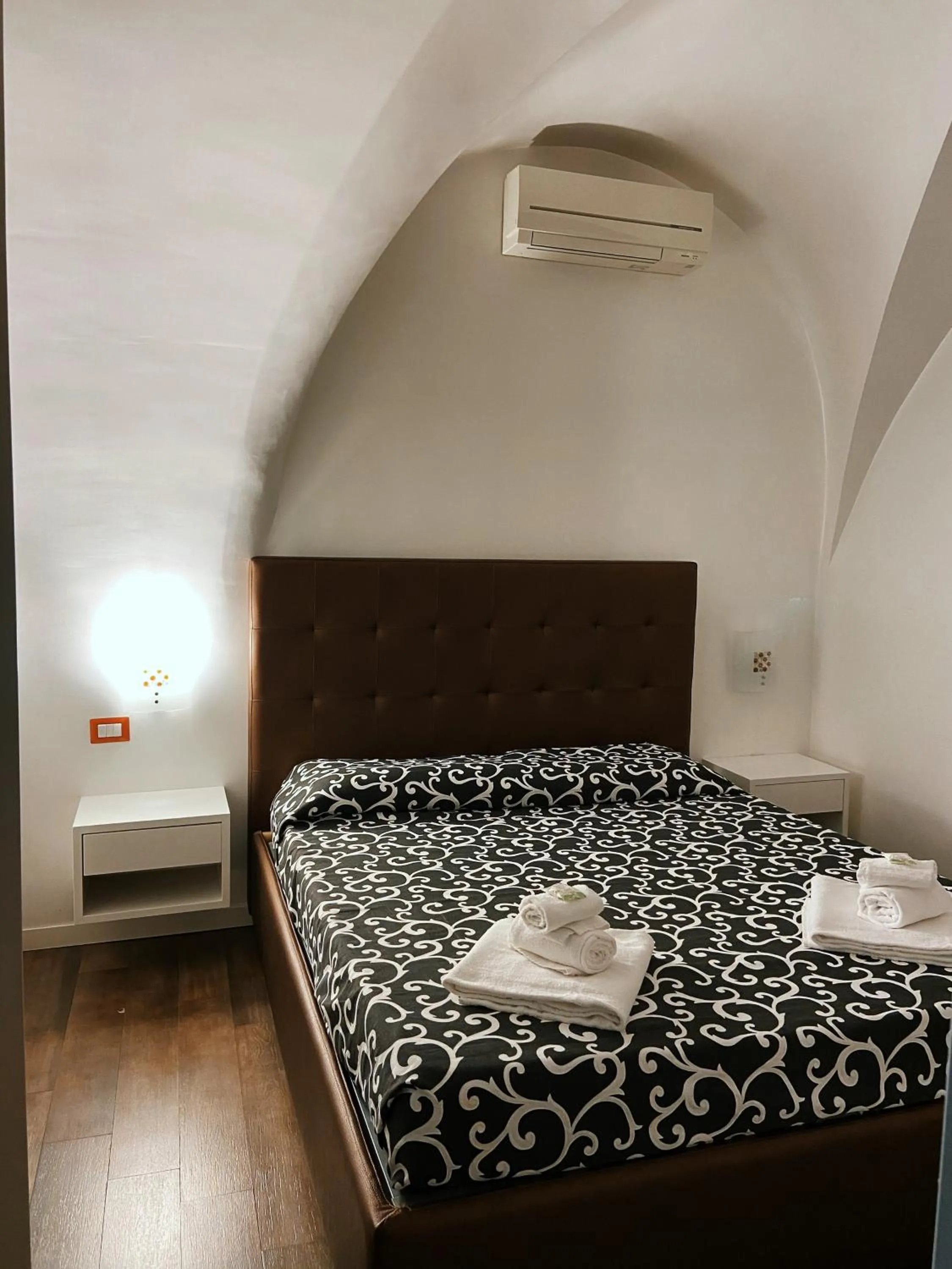 Bed in Casa Giorgia luxury apartment