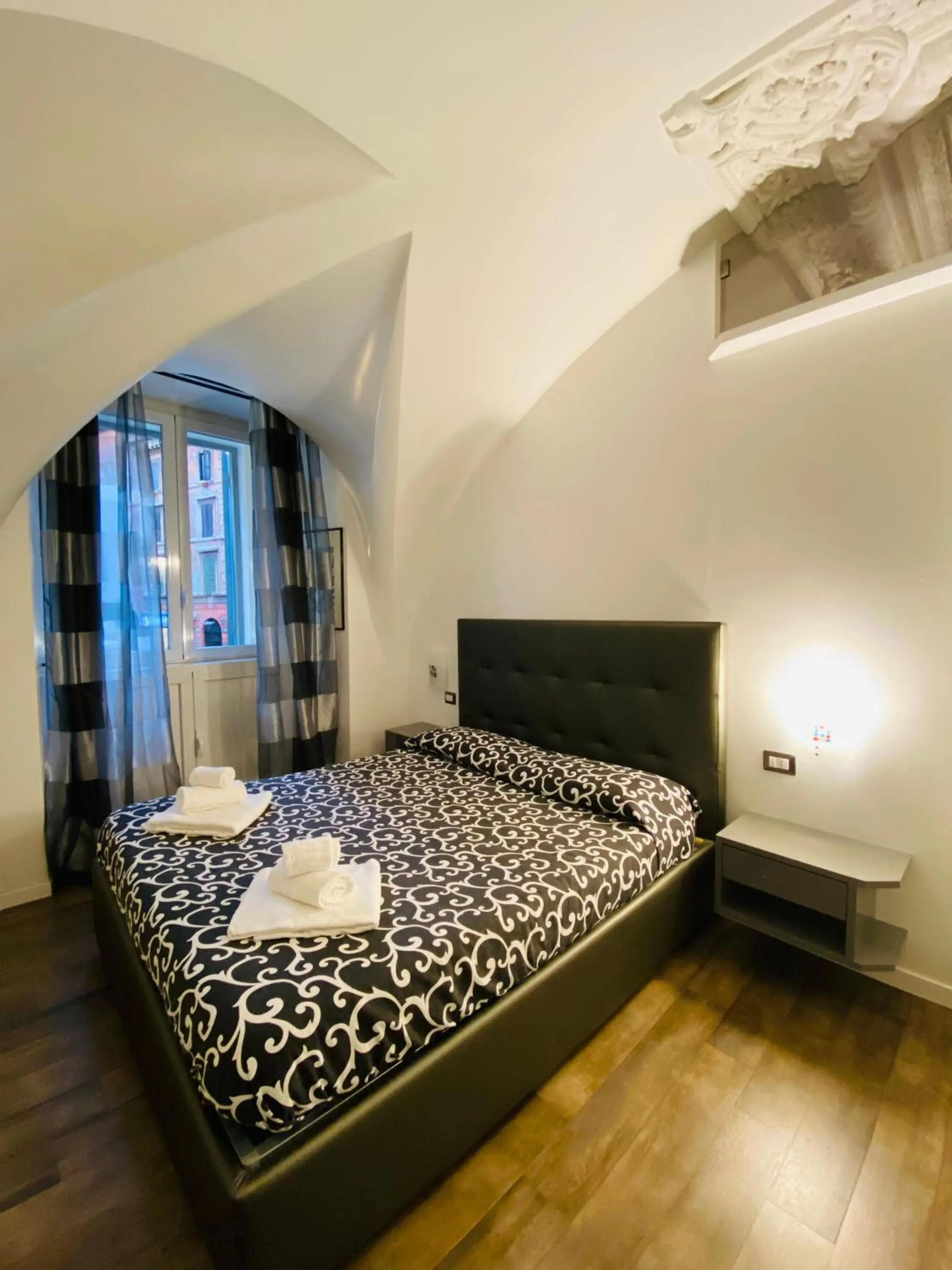 Bed in Casa Giorgia luxury apartment