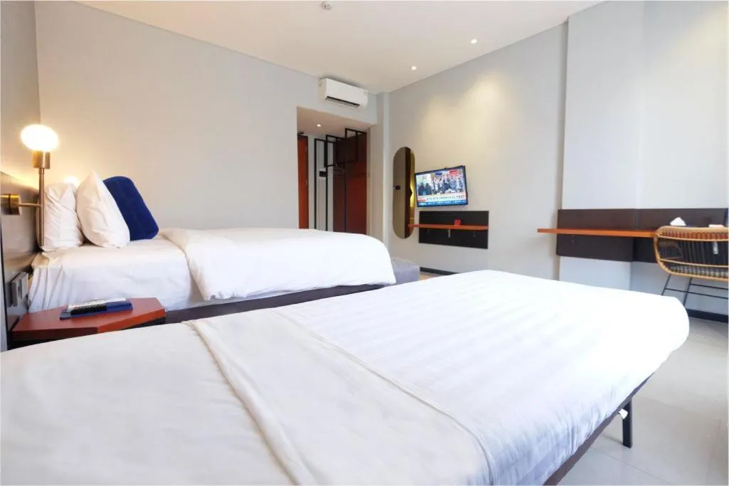 Bed in Hotel Youstay Semarang by Sinergi