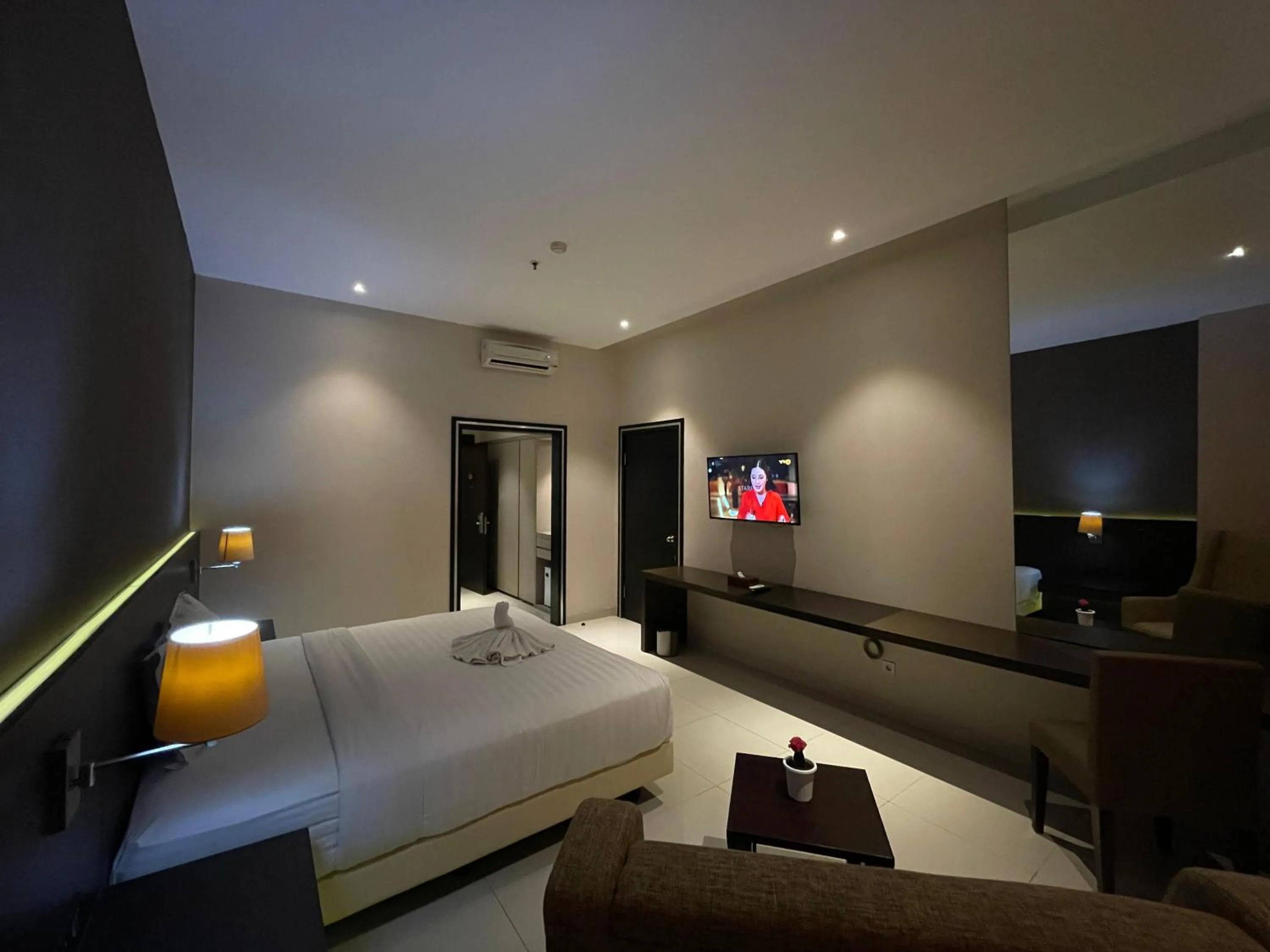 Bed in Grand Arjuna Hotel