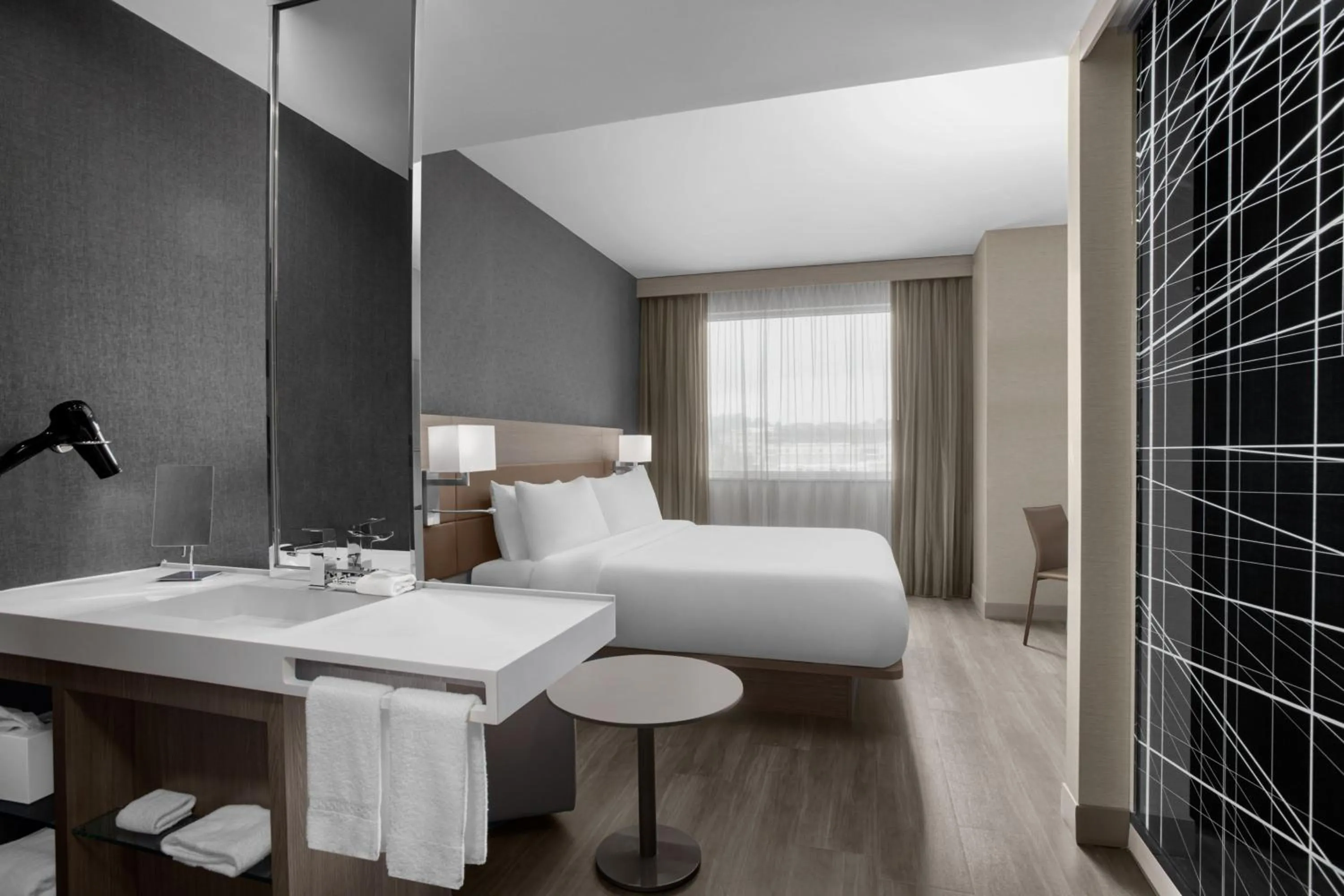 Photo of the whole room, Bed in AC Hotel by Marriott Pittsburgh Southpointe