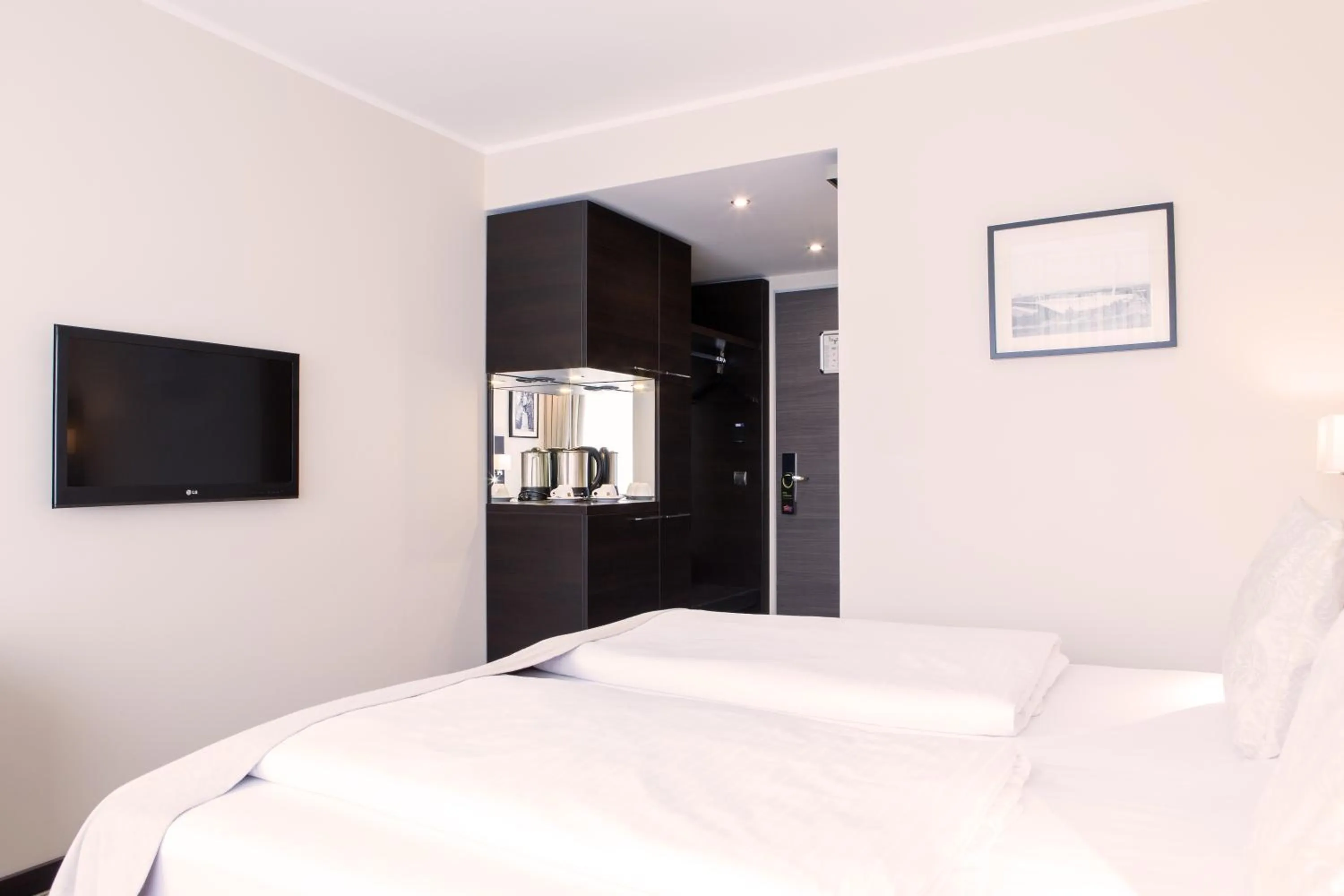 Photo of the whole room, Bed in Karlstor Gästehaus