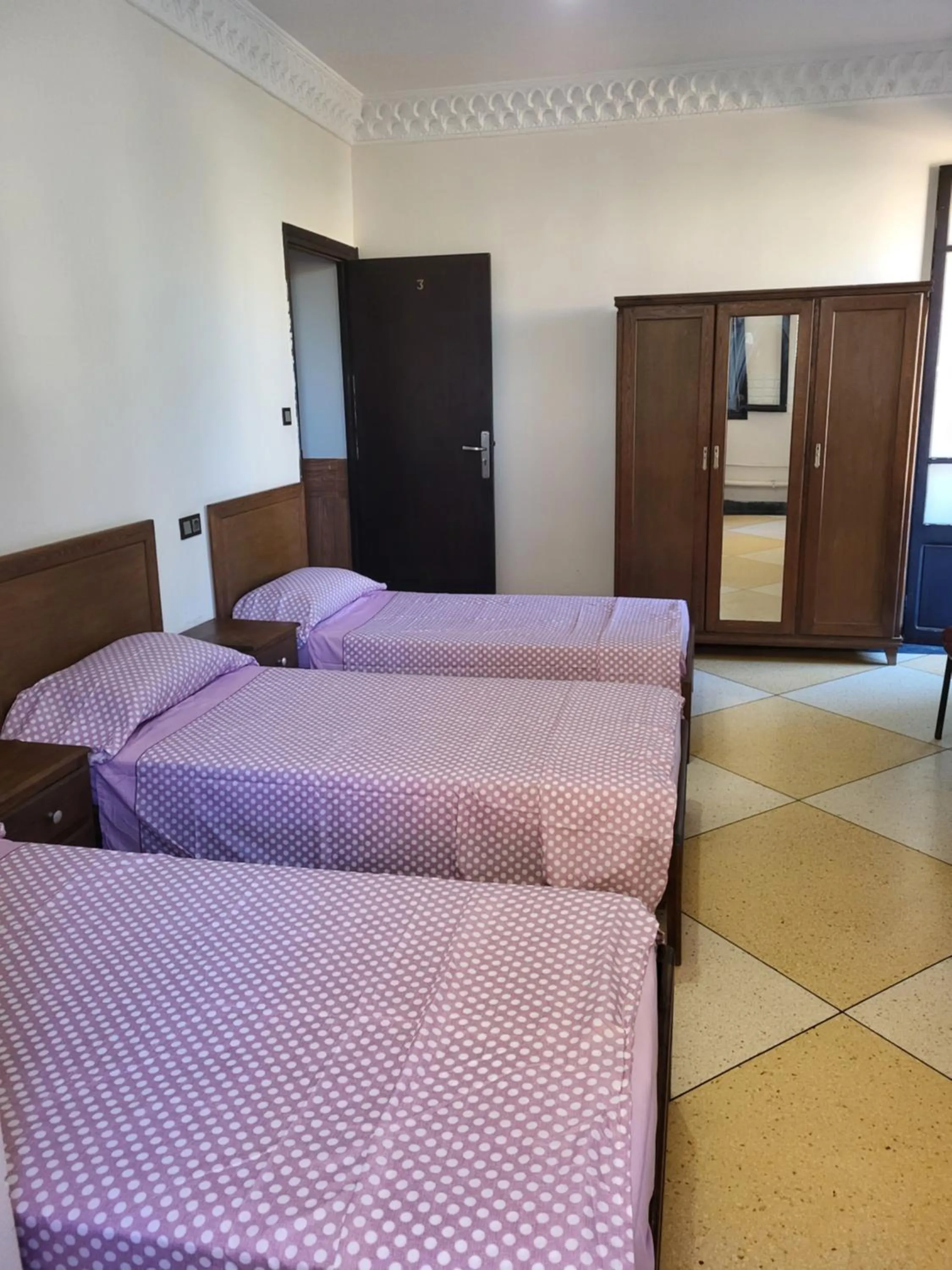 Bed in Hotel El Maghreb Al Kabir