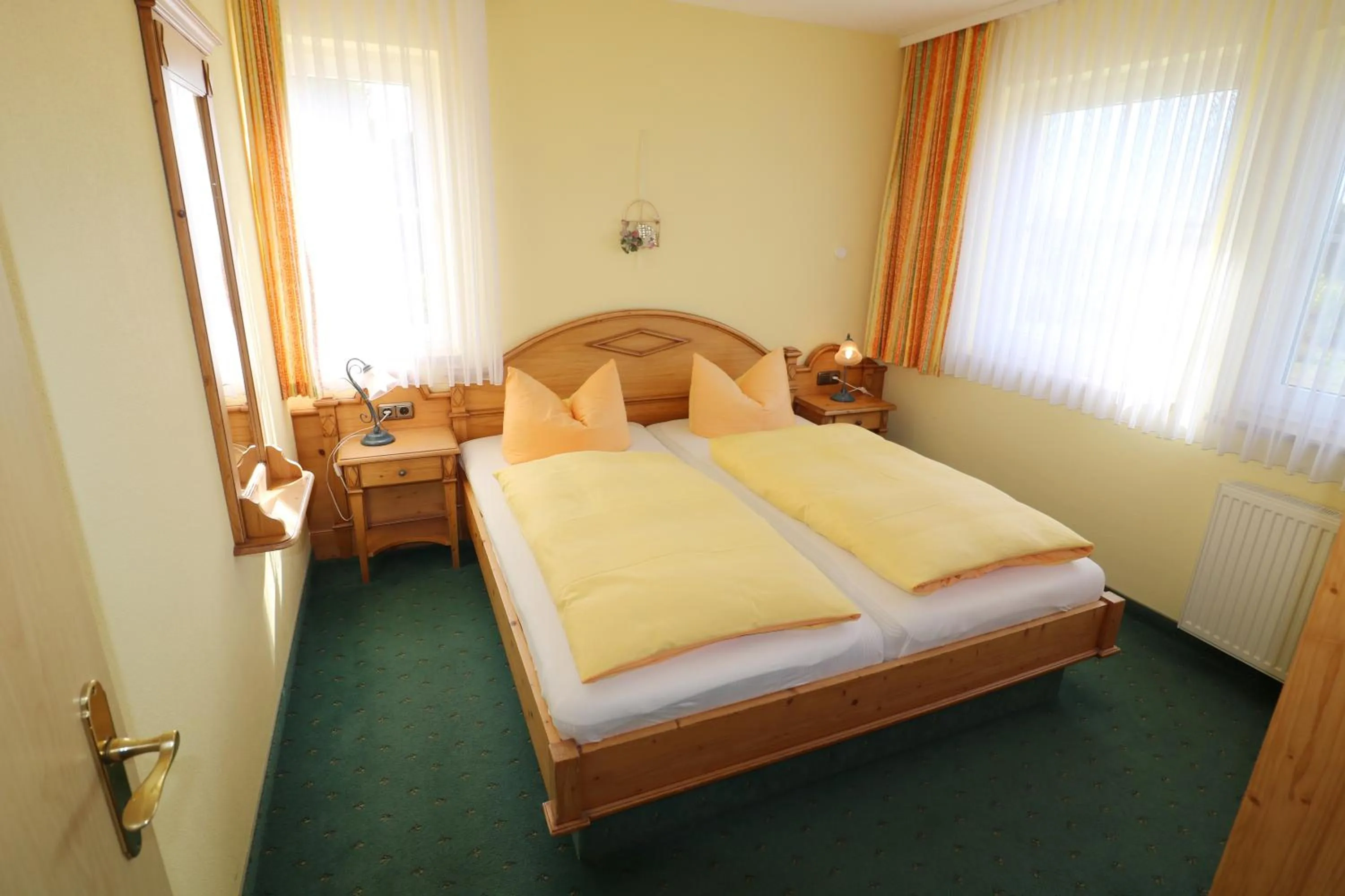 Bed in Ferienwohnung Zur Hopfenkönigin