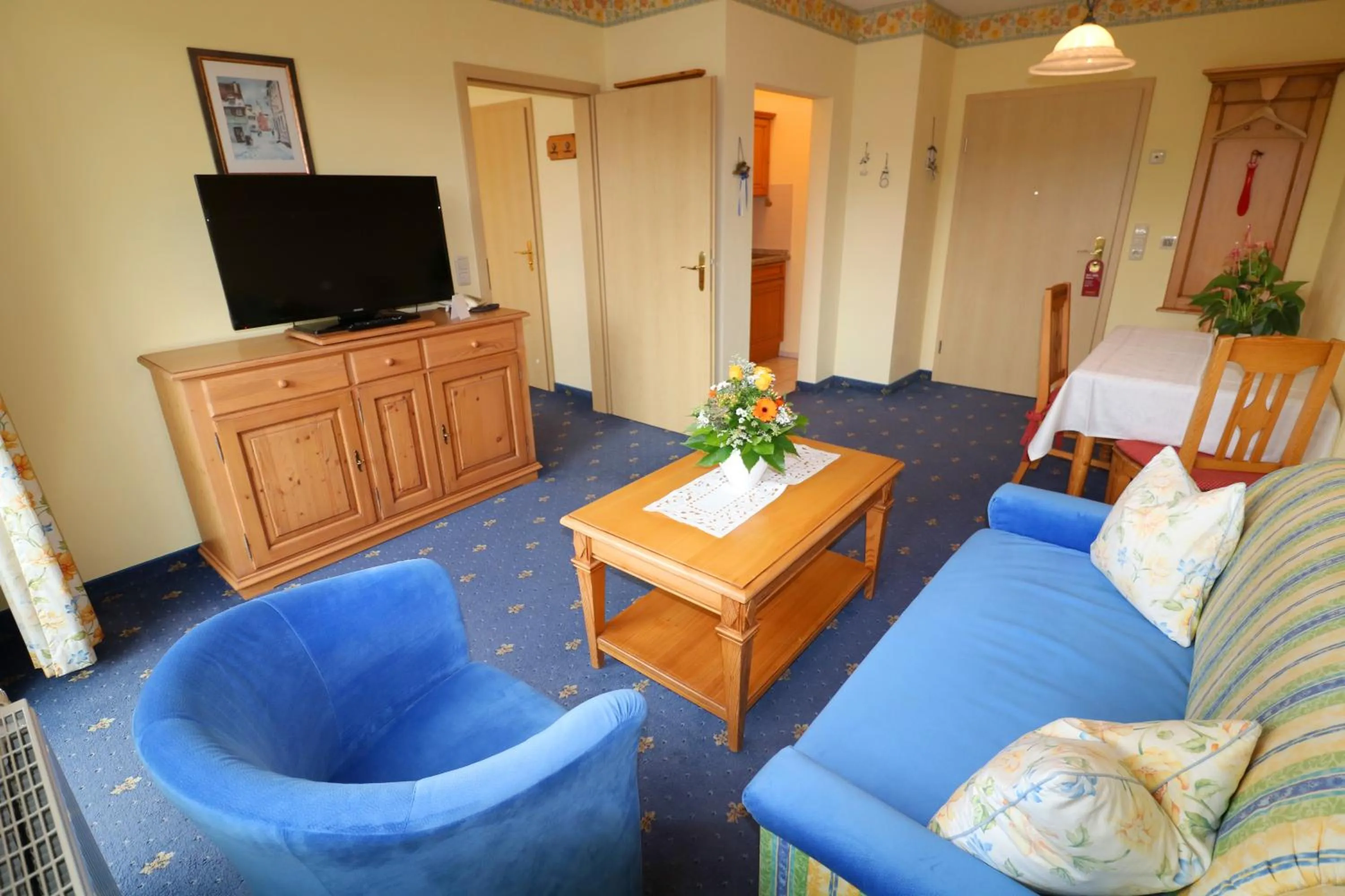 Communal lounge/ TV room in Ferienwohnung Zur Hopfenkönigin