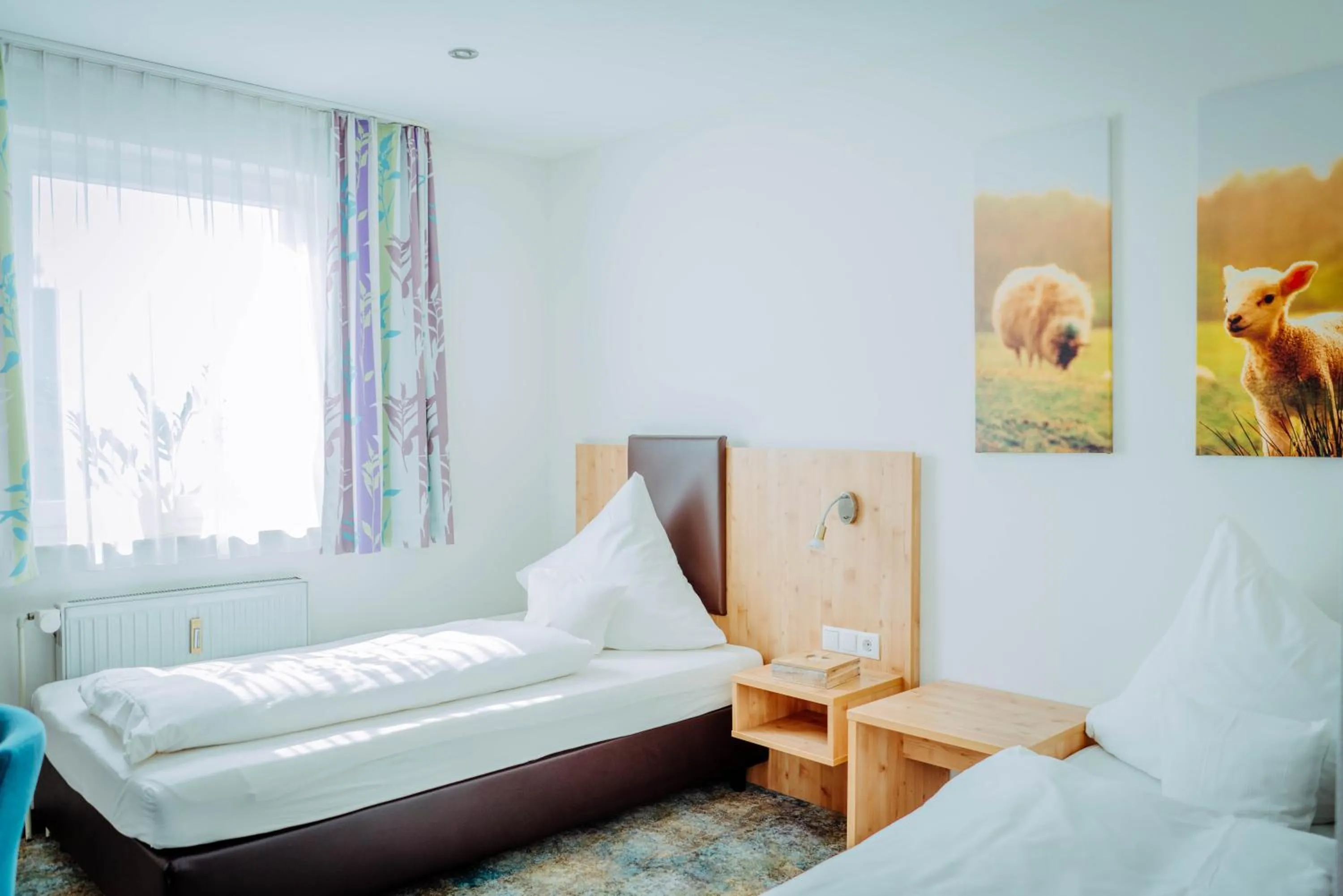 Photo of the whole room, Bed in Garni-Hotel Goldenes Lamm