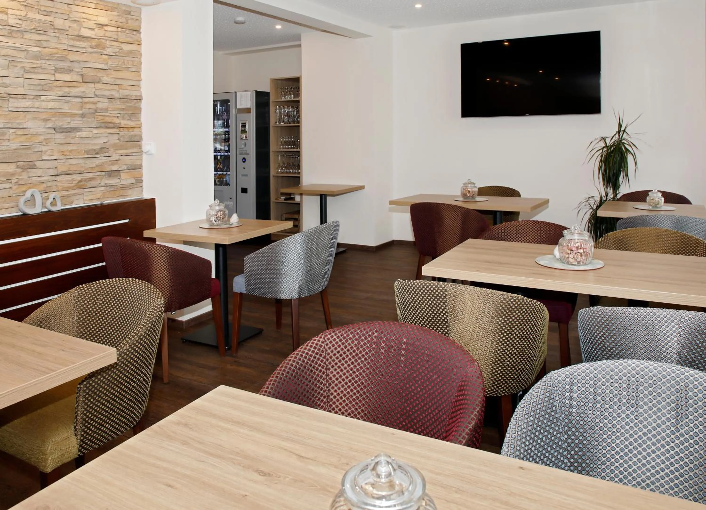 Communal lounge/ TV room in Garni-Hotel Goldenes Lamm