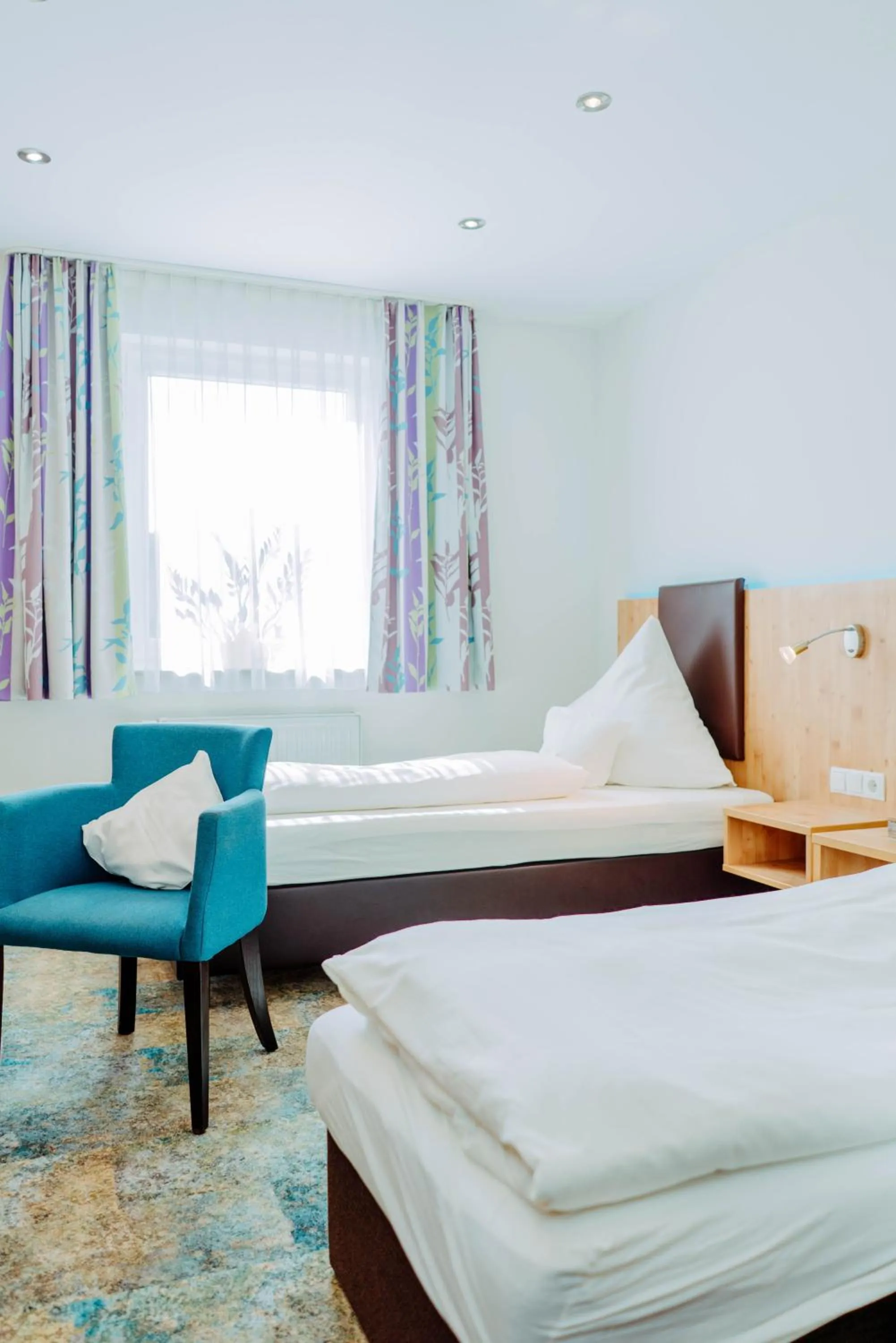 Bed in Garni-Hotel Goldenes Lamm