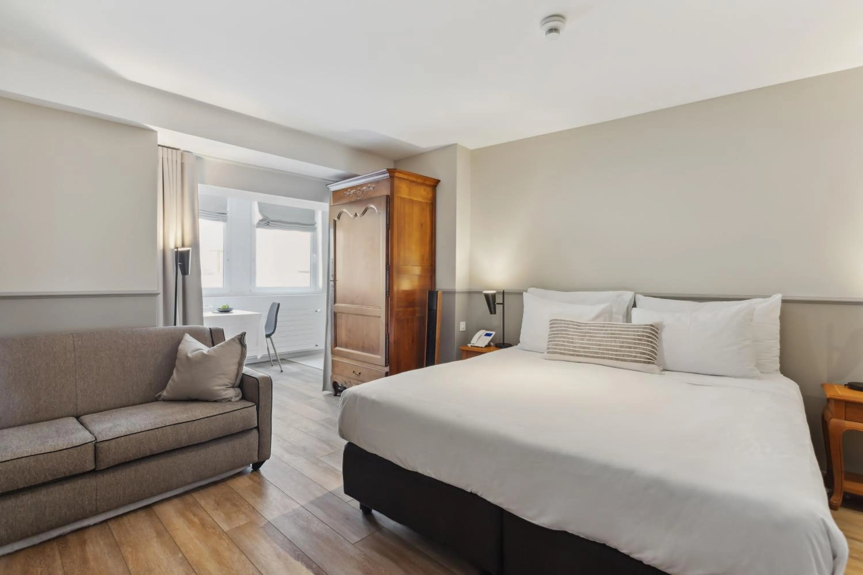 Photo of the whole room, Bed in Hôtel de la Couronne