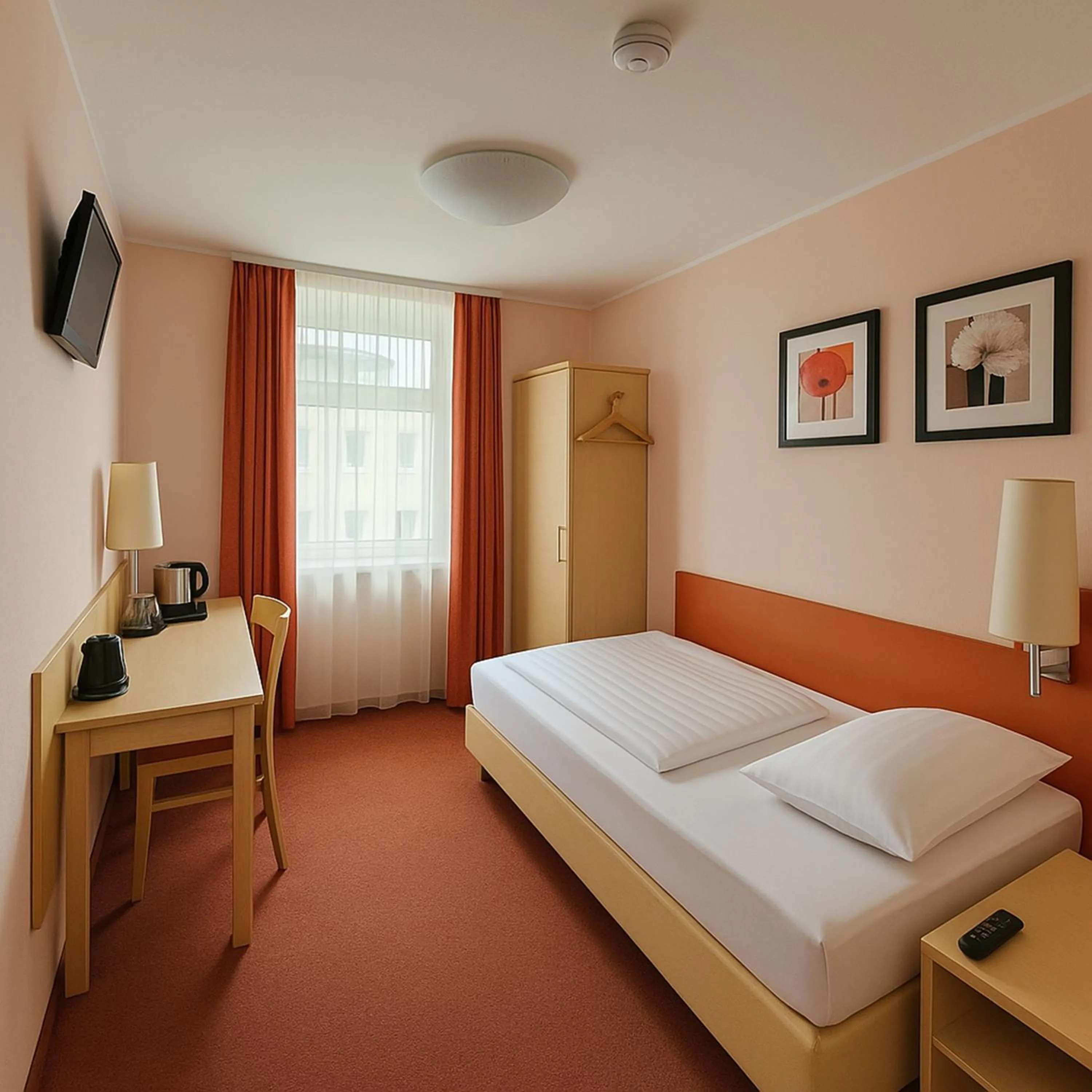 Photo of the whole room, Bed in Atomis Hotel Düsseldorf City