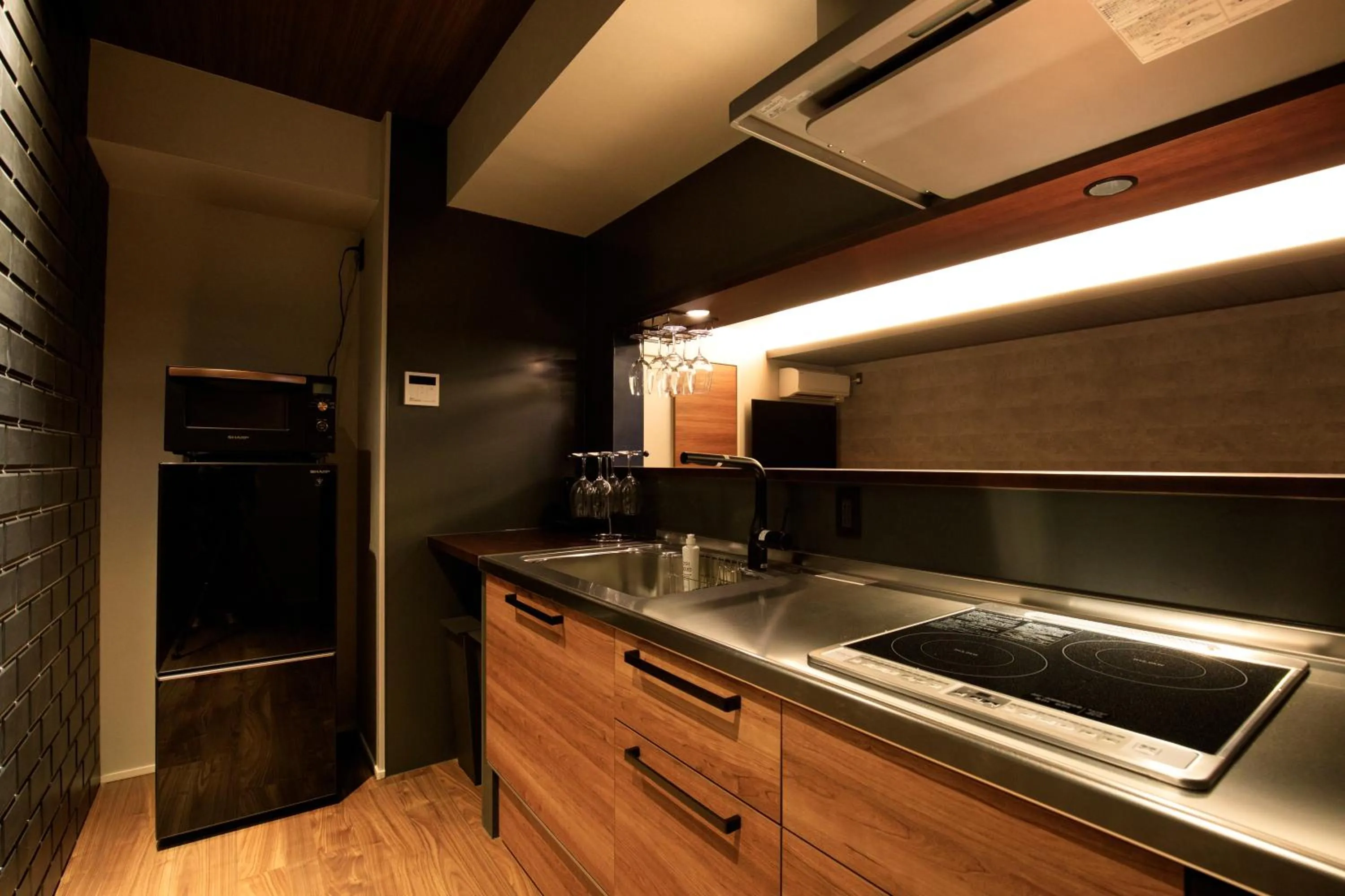 Kitchen or kitchenette in HOTEL&CO