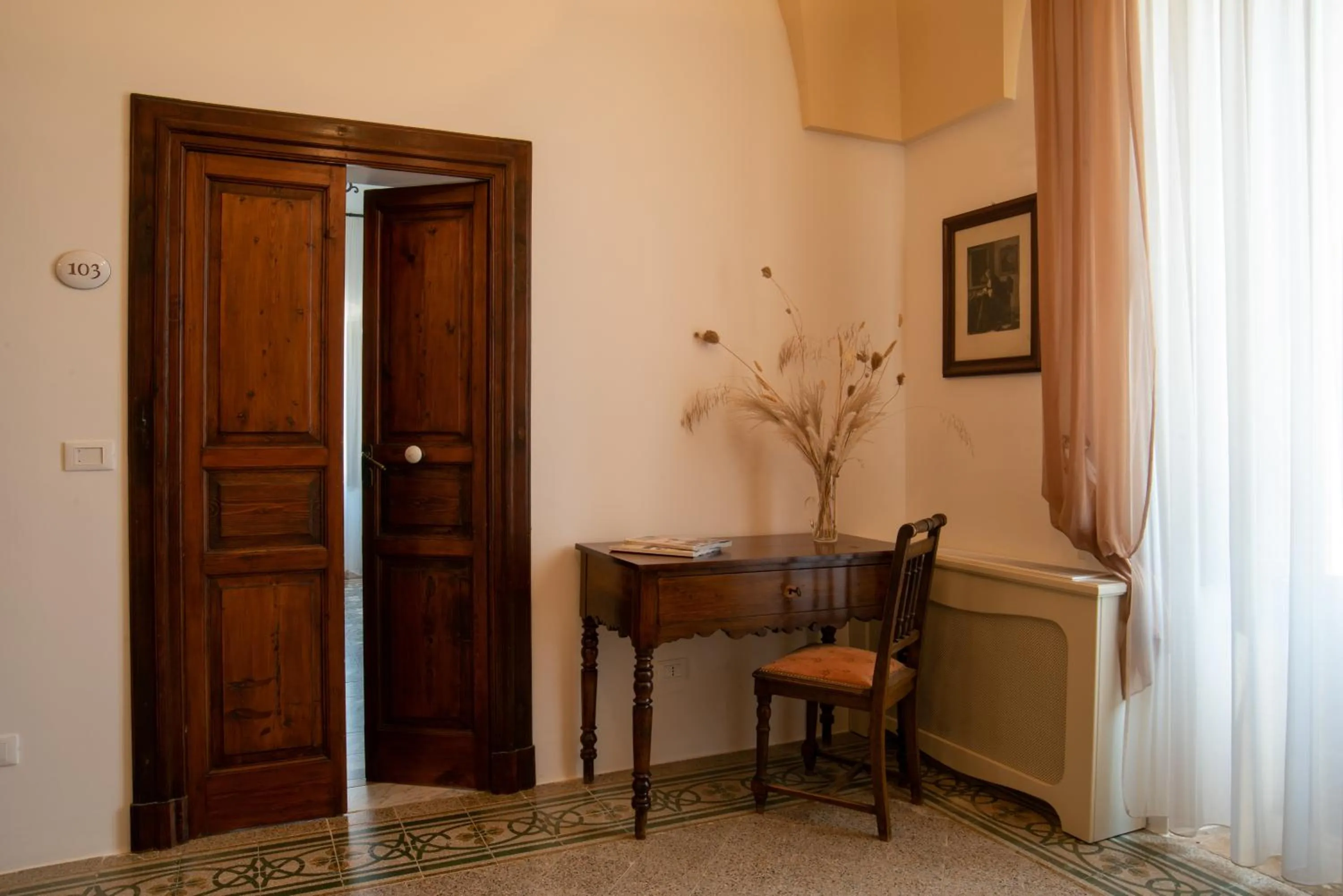 Communal lounge/ TV room in Masseria Borgo Santuri