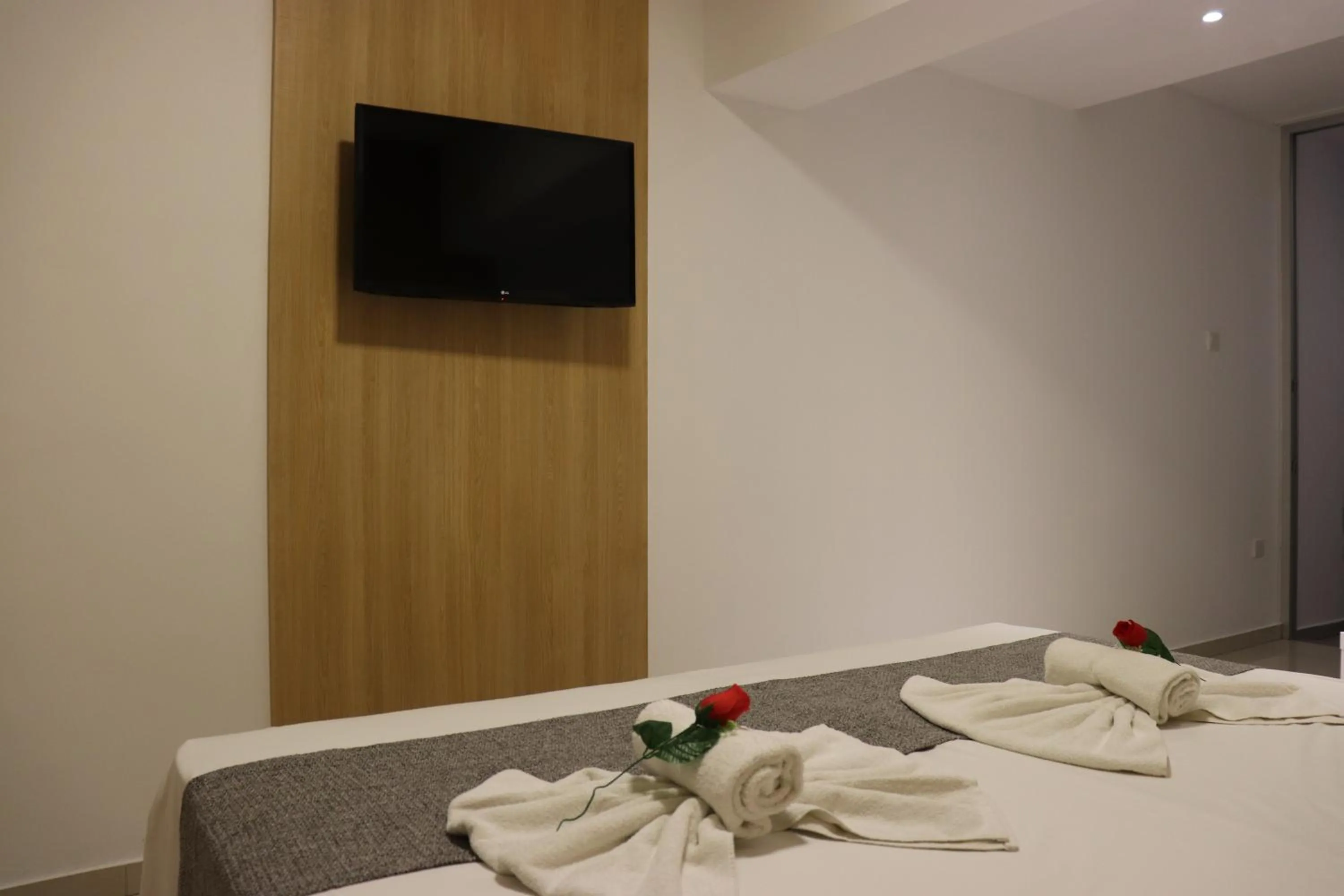 TV and multimedia, Bed in JOY Hotel Apts