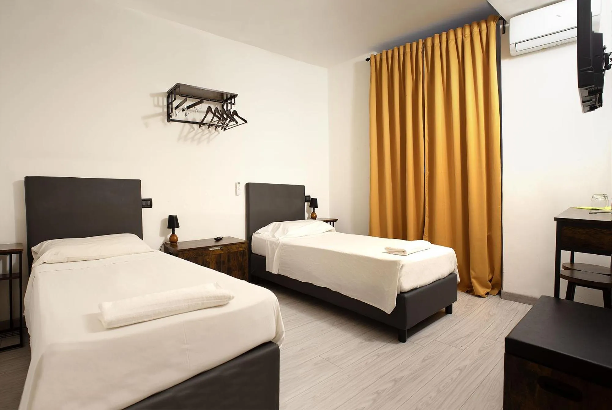 Photo of the whole room, Bed in Red and Blues Music Hotel Genova