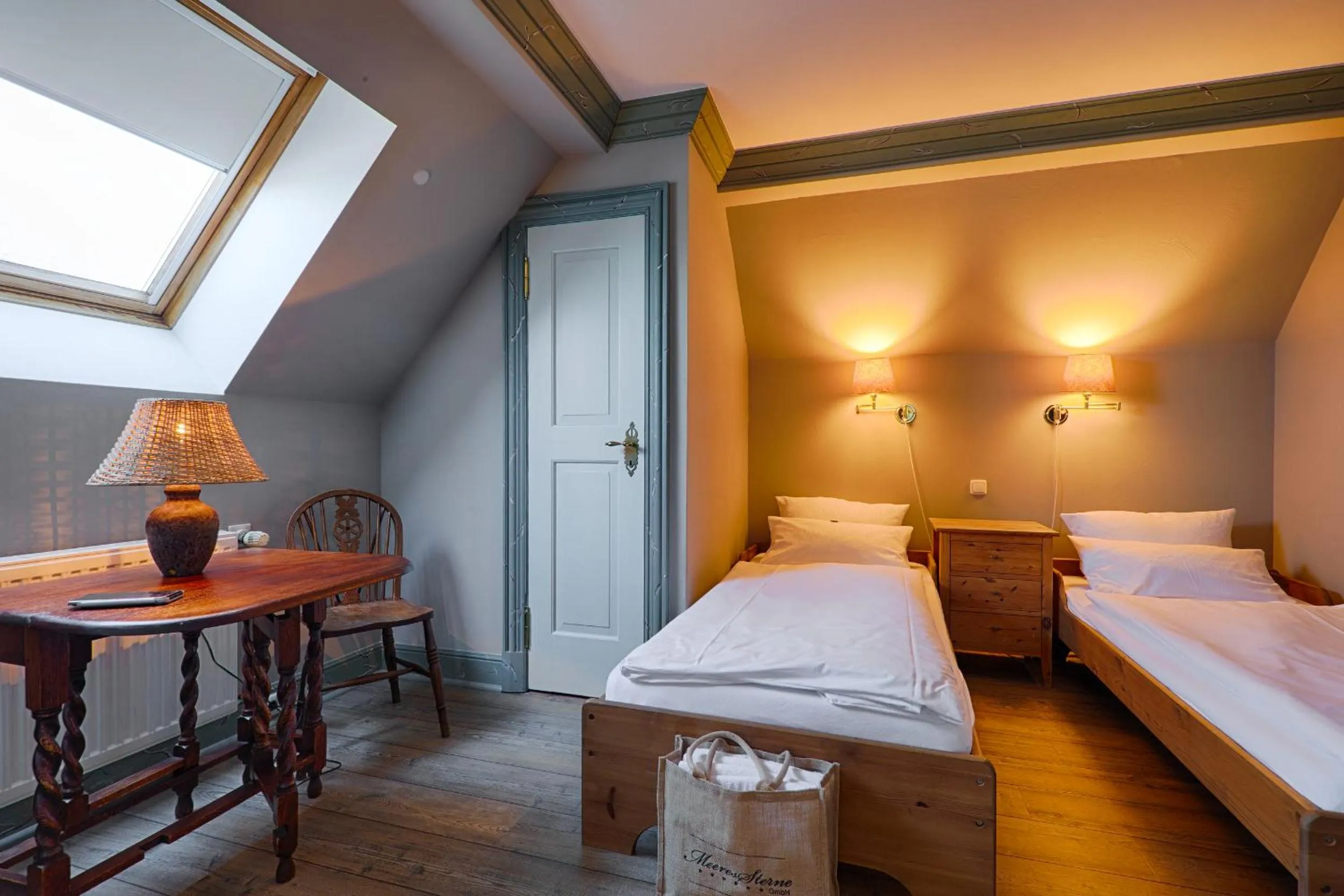 Photo of the whole room, Bed in Meeressterne Hotel Forsthaus Damerow