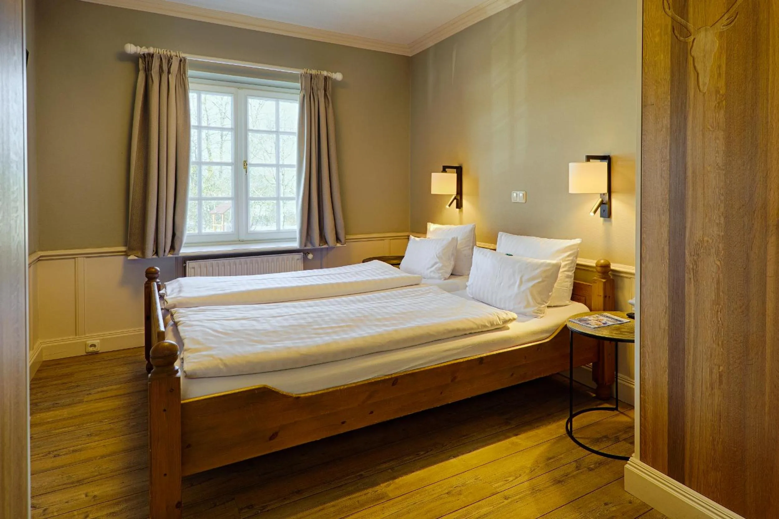 Photo of the whole room, Bed in Meeressterne Hotel Forsthaus Damerow