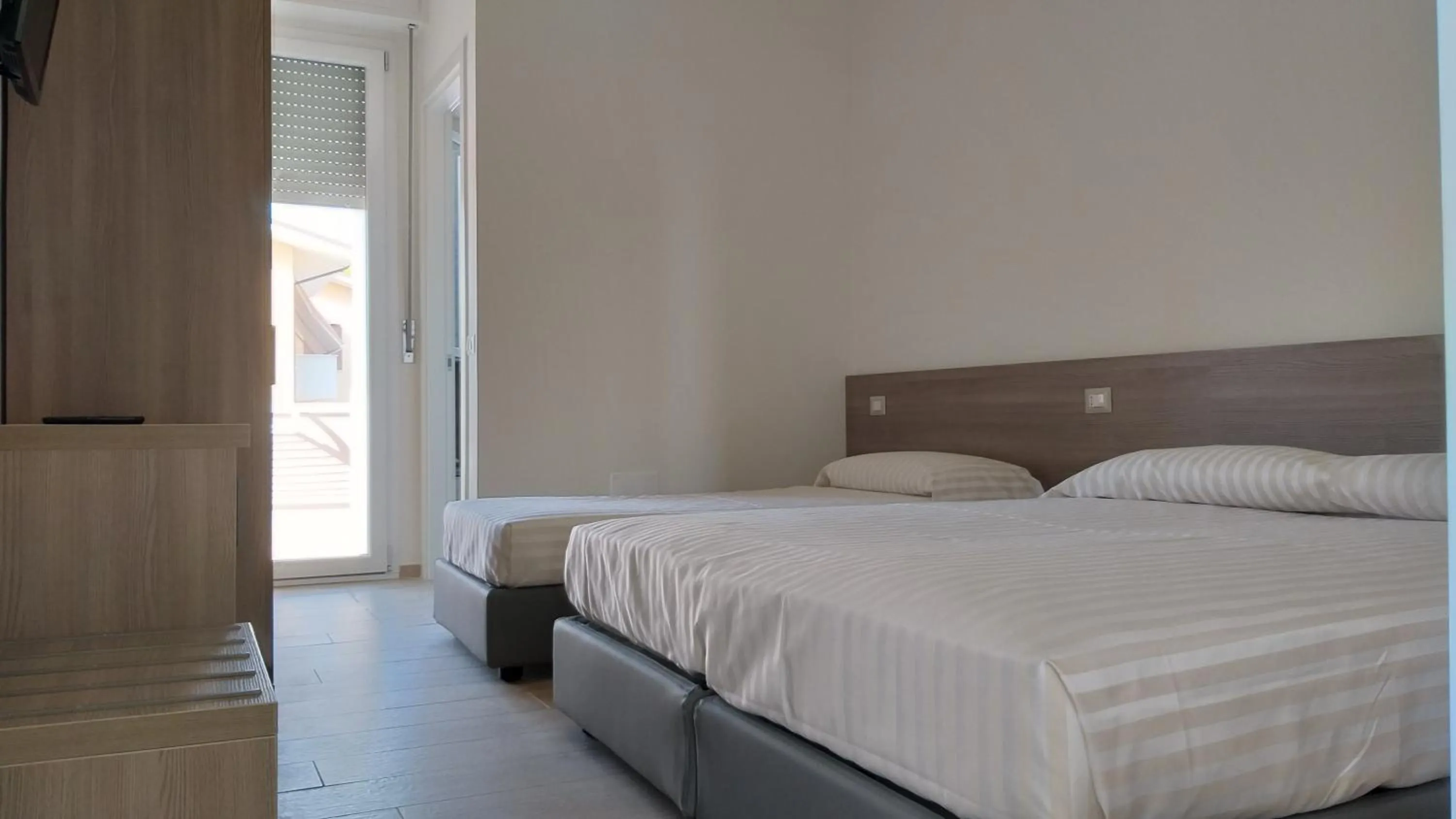 Bed in HOTELRISTORANTE IL PUNTO