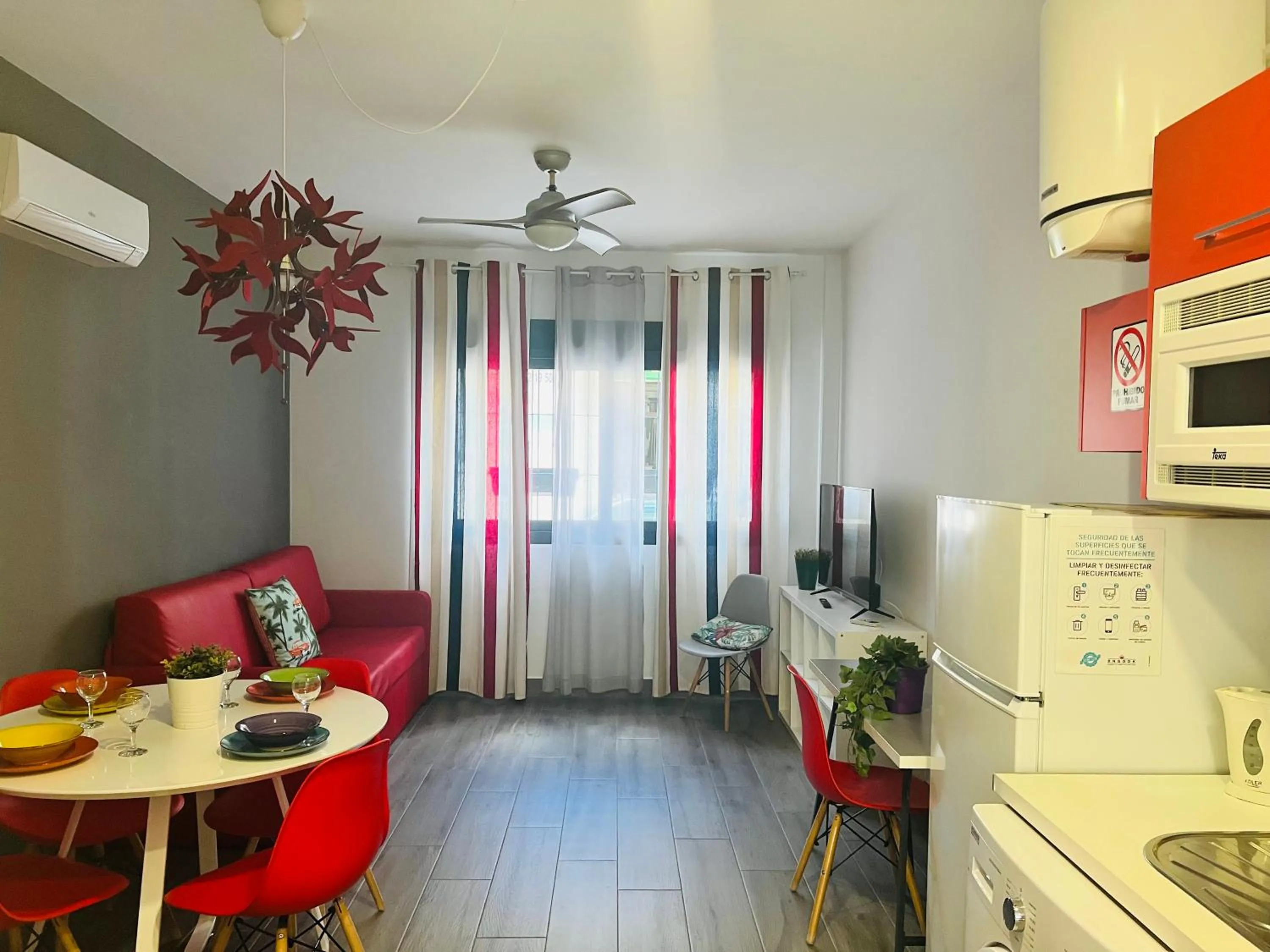 TV and multimedia in Bnbook Medea Apartments