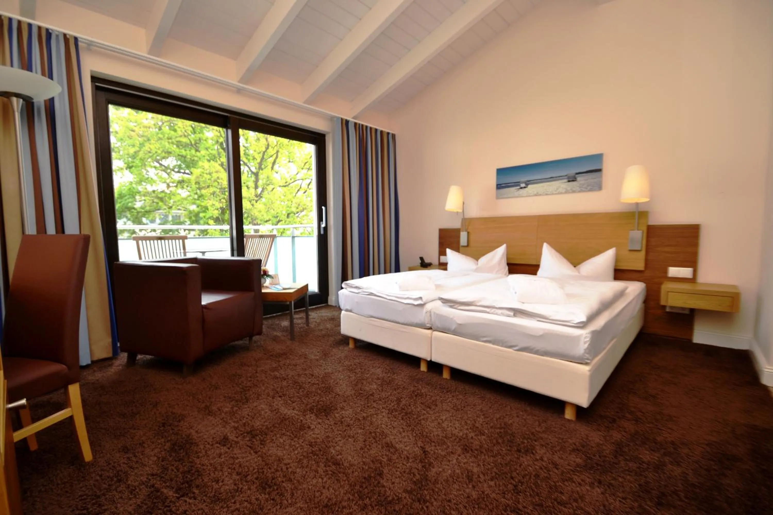 Photo of the whole room, Bed in Strandhotel Binz