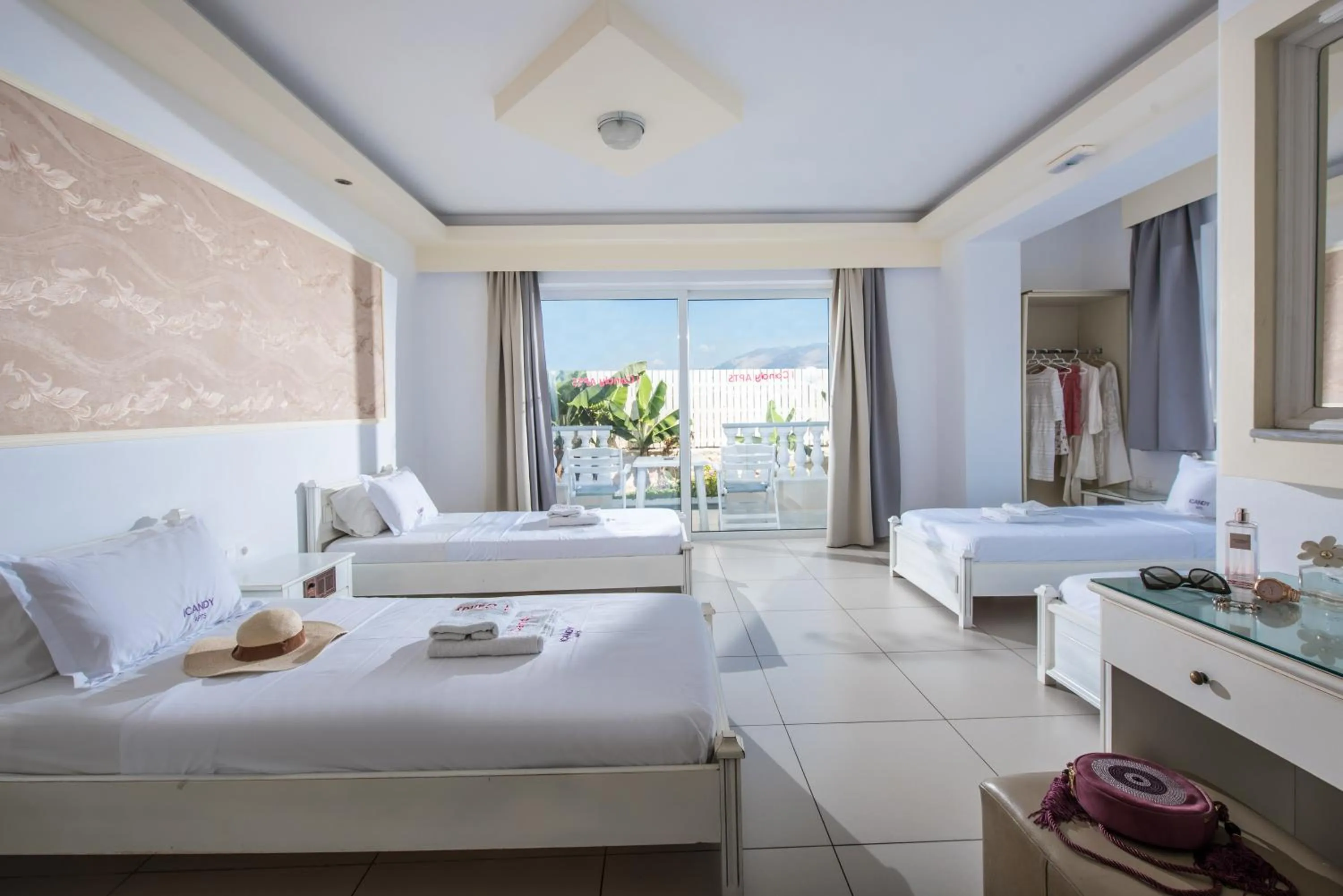 Photo of the whole room, Bed in I Candy Malia by Estia