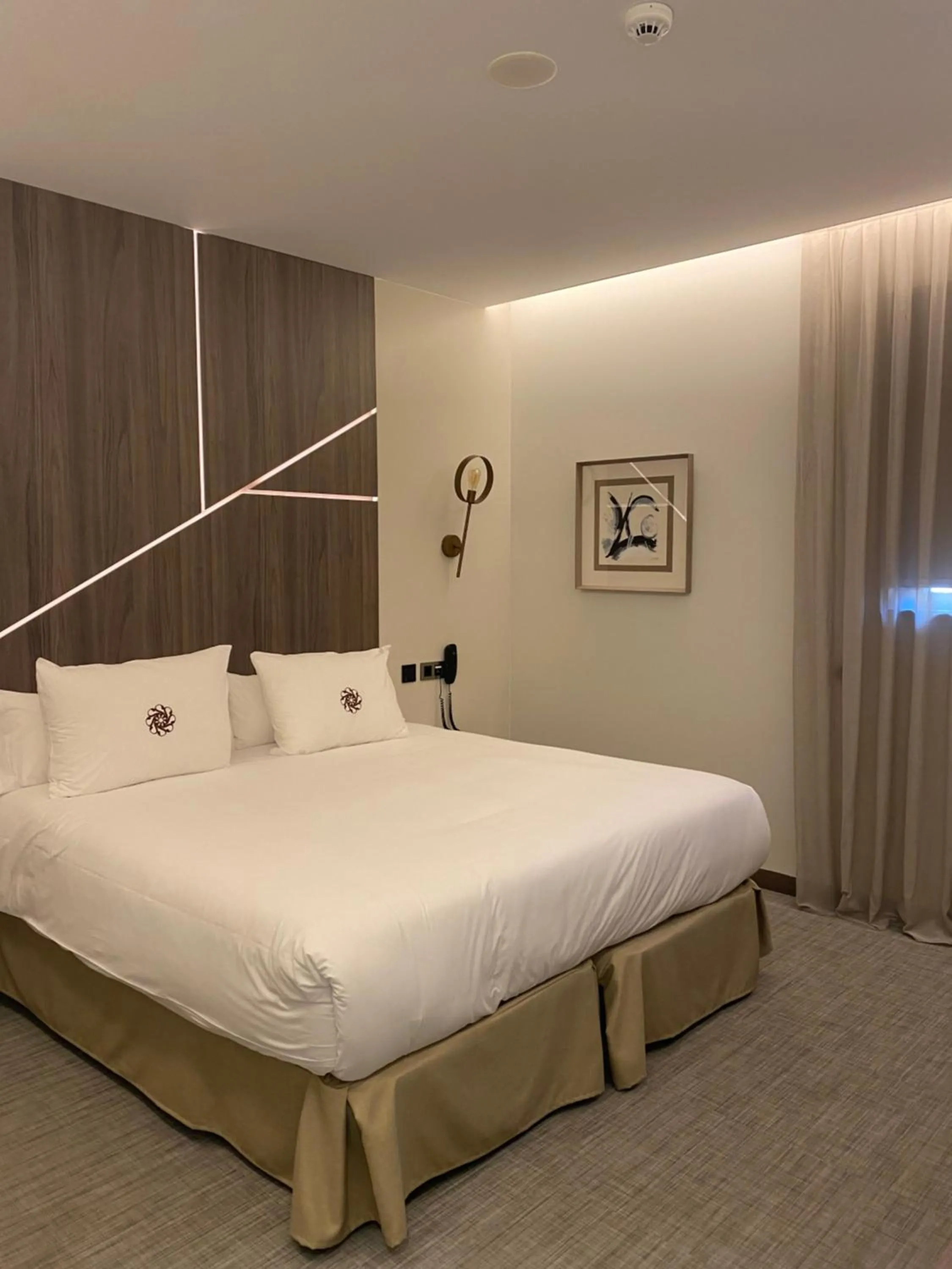 Bed in Ansares Hotel