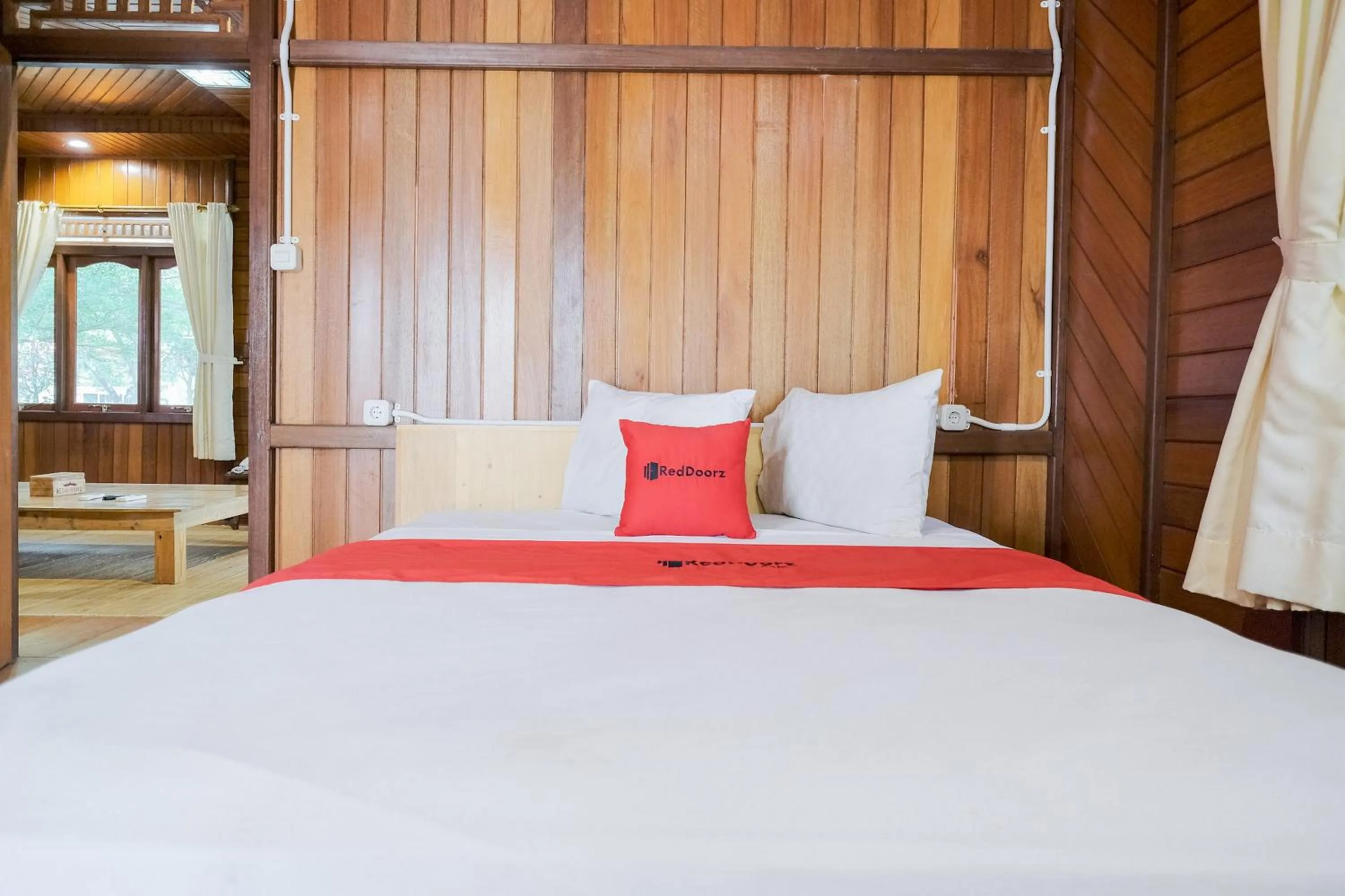 Bed in RedDoorz at Hotel Negeri Baru Kalianda Lampung