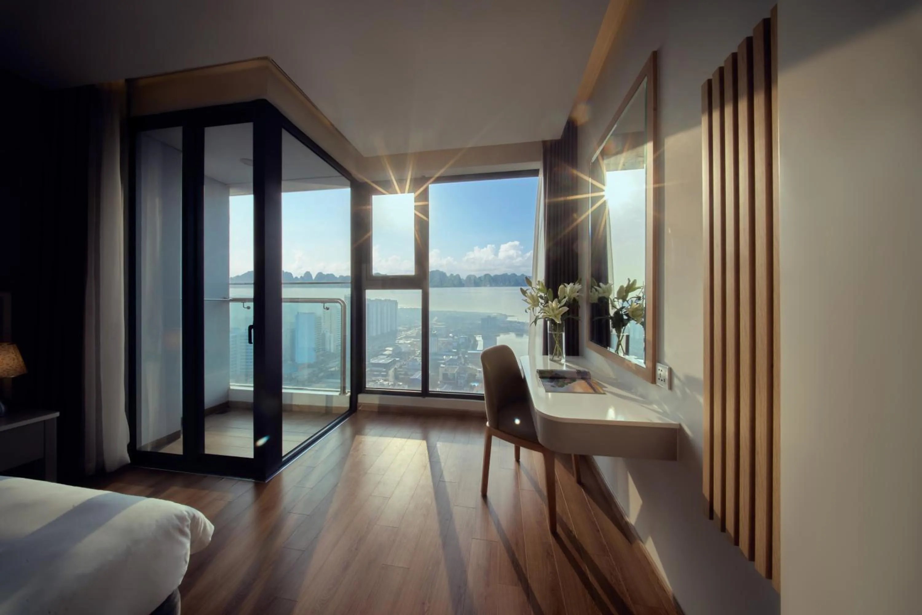 Property building, Bed in DeLaSea Ha Long Hotel - Modern Bayview Escape