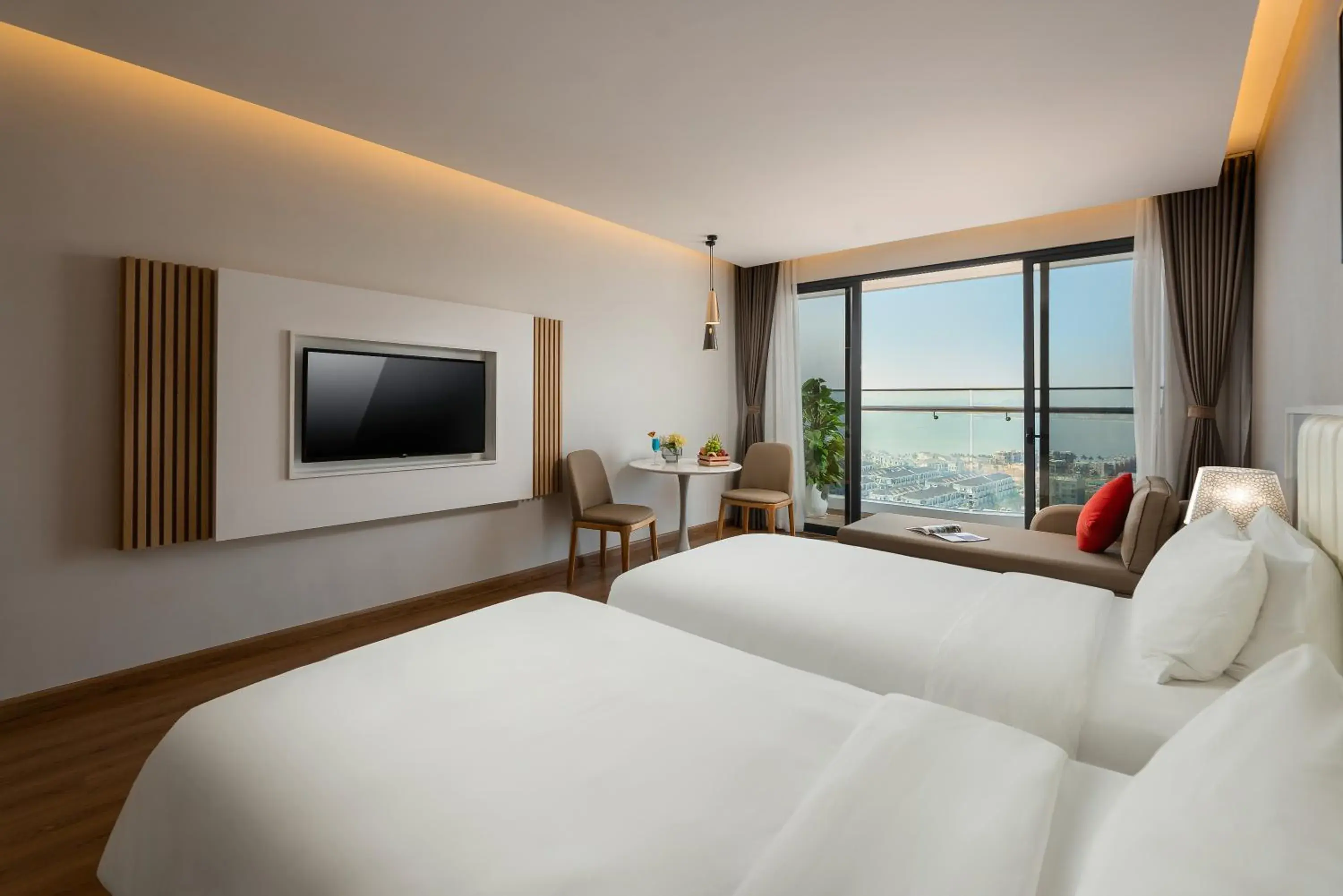 Deluxe Twin Room with Sea View in DeLaSea Ha Long Hotel - Modern Bayview Escape Deluxe Twin Room with Sea View in DeLaSea Ha Long Hotel - Modern Bayview Escape