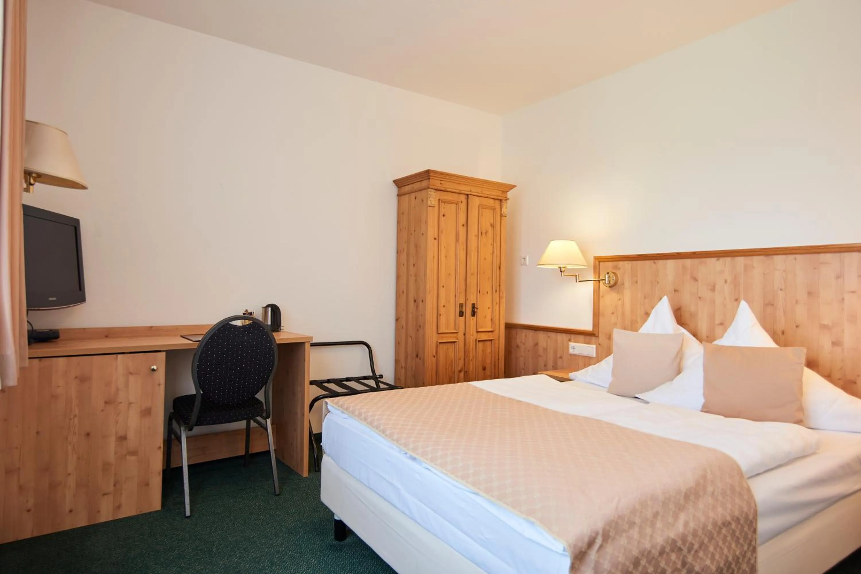 Bed in Hotel Restaurant Adler