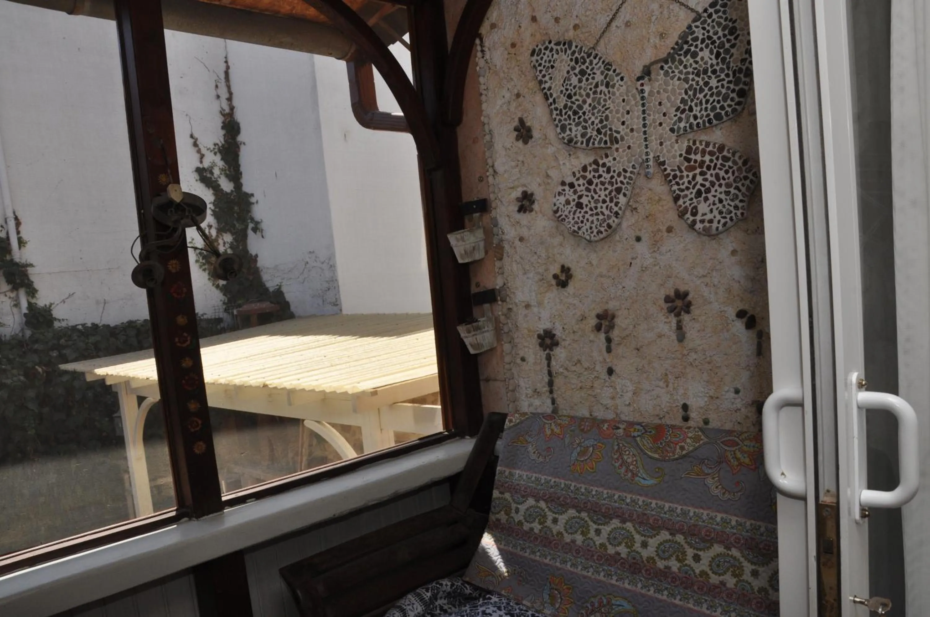 Seating area, Bed in La Casa Carina