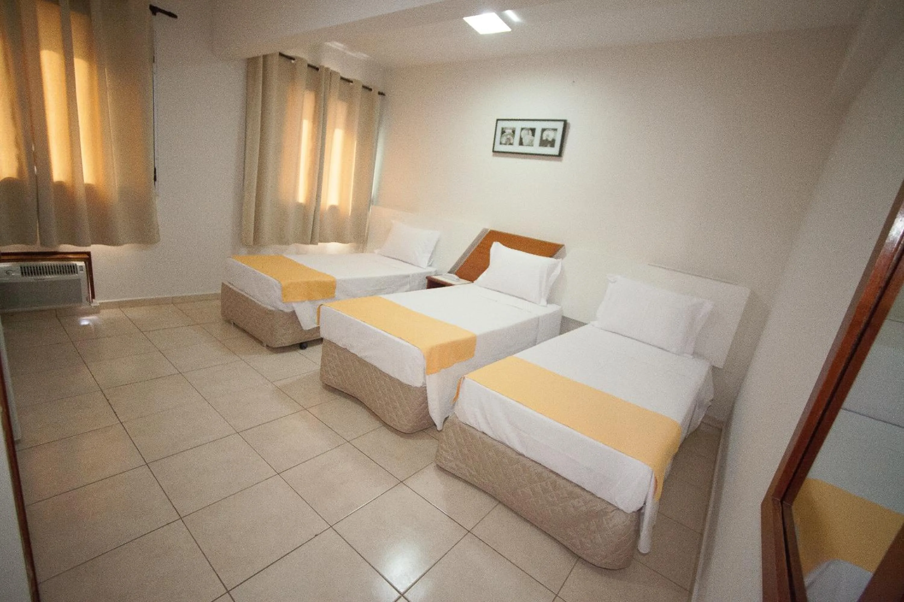 Bed in Láparos Hotel