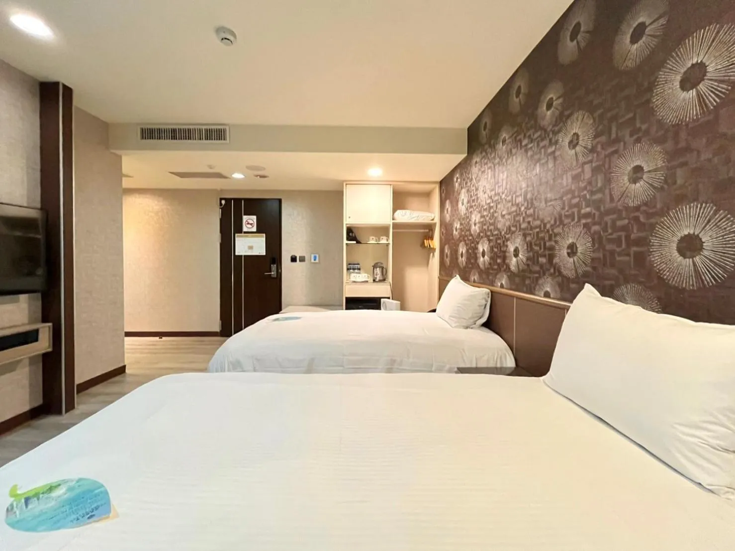 Bed in Grand Earl Hotel