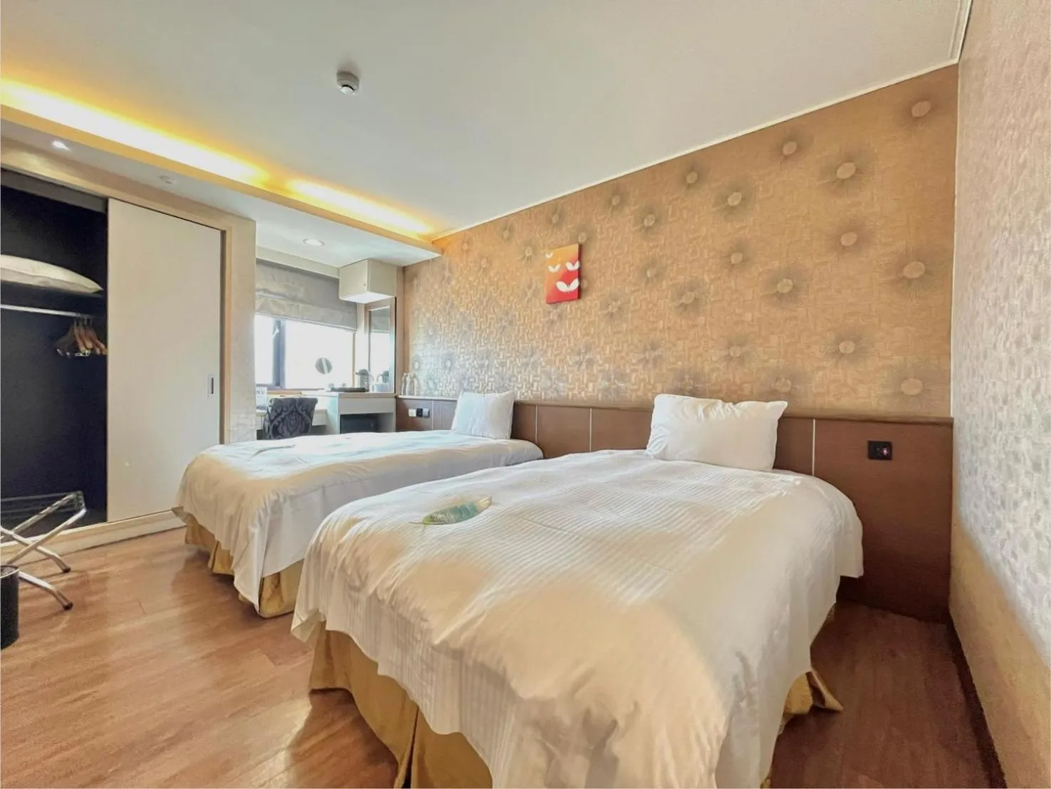 Bed in Grand Earl Hotel