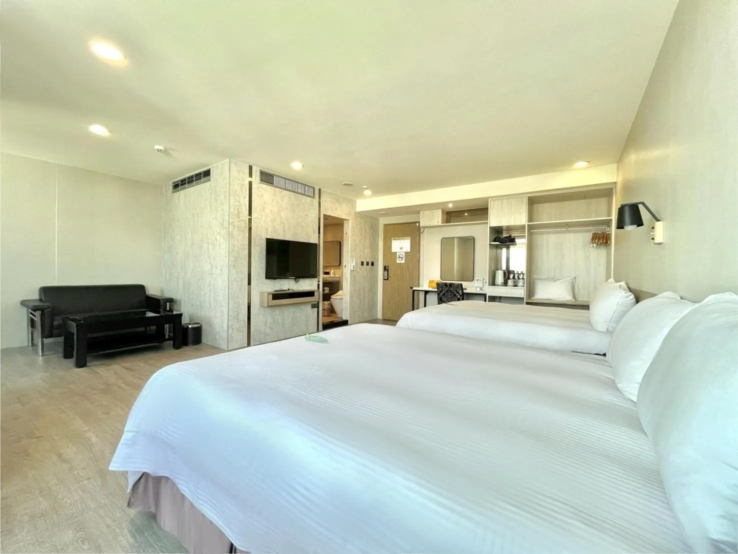 Bed in Grand Earl Hotel