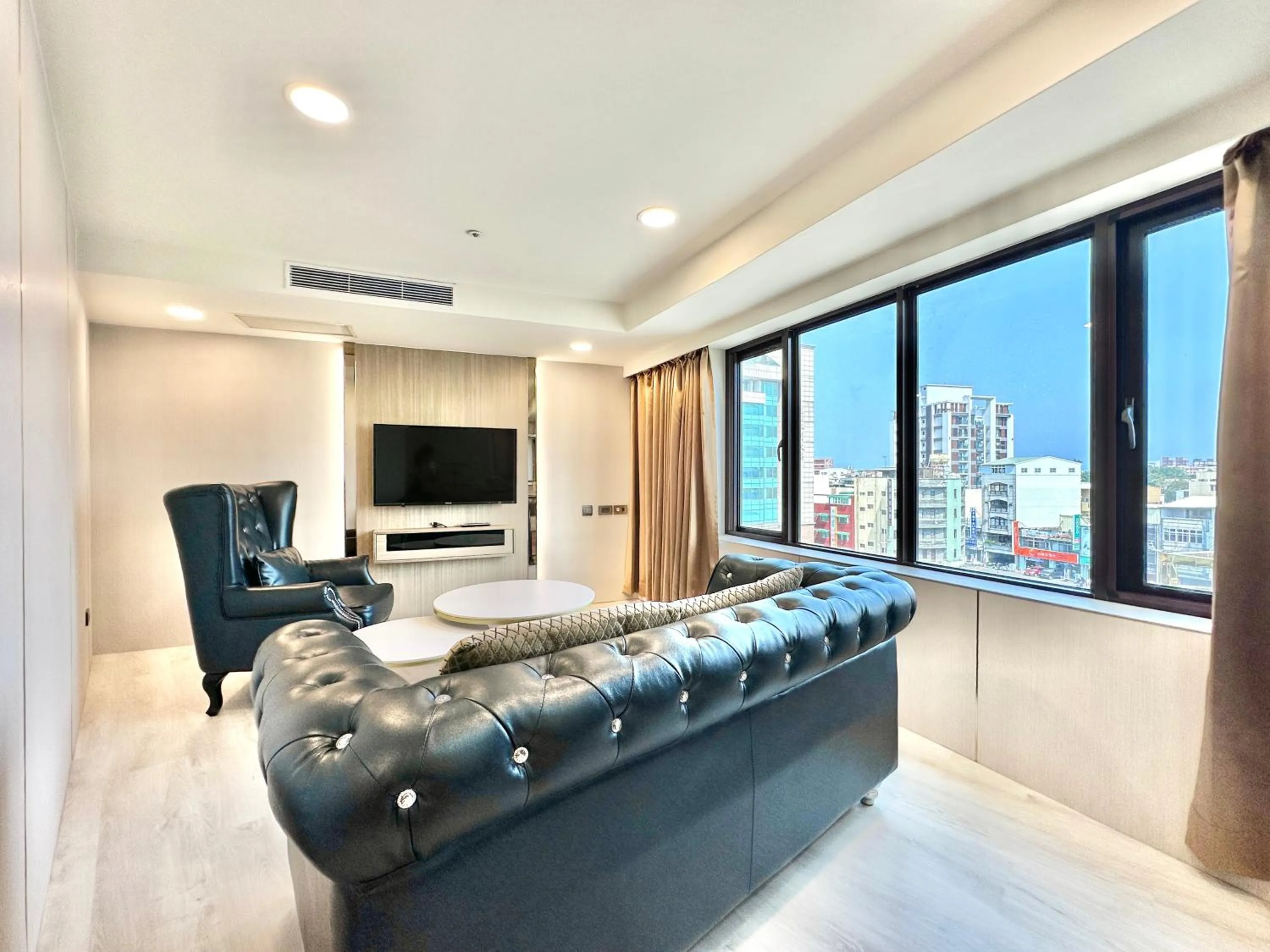 Bed in Grand Earl Hotel