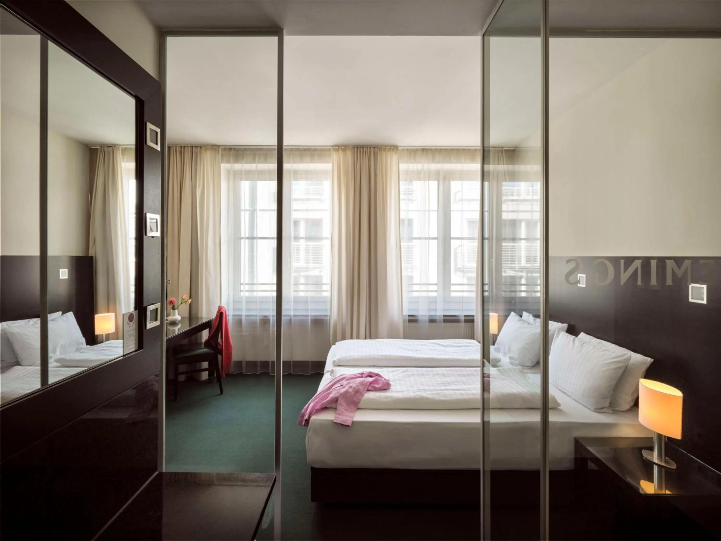 Bedroom in Flemings Hotel München-City