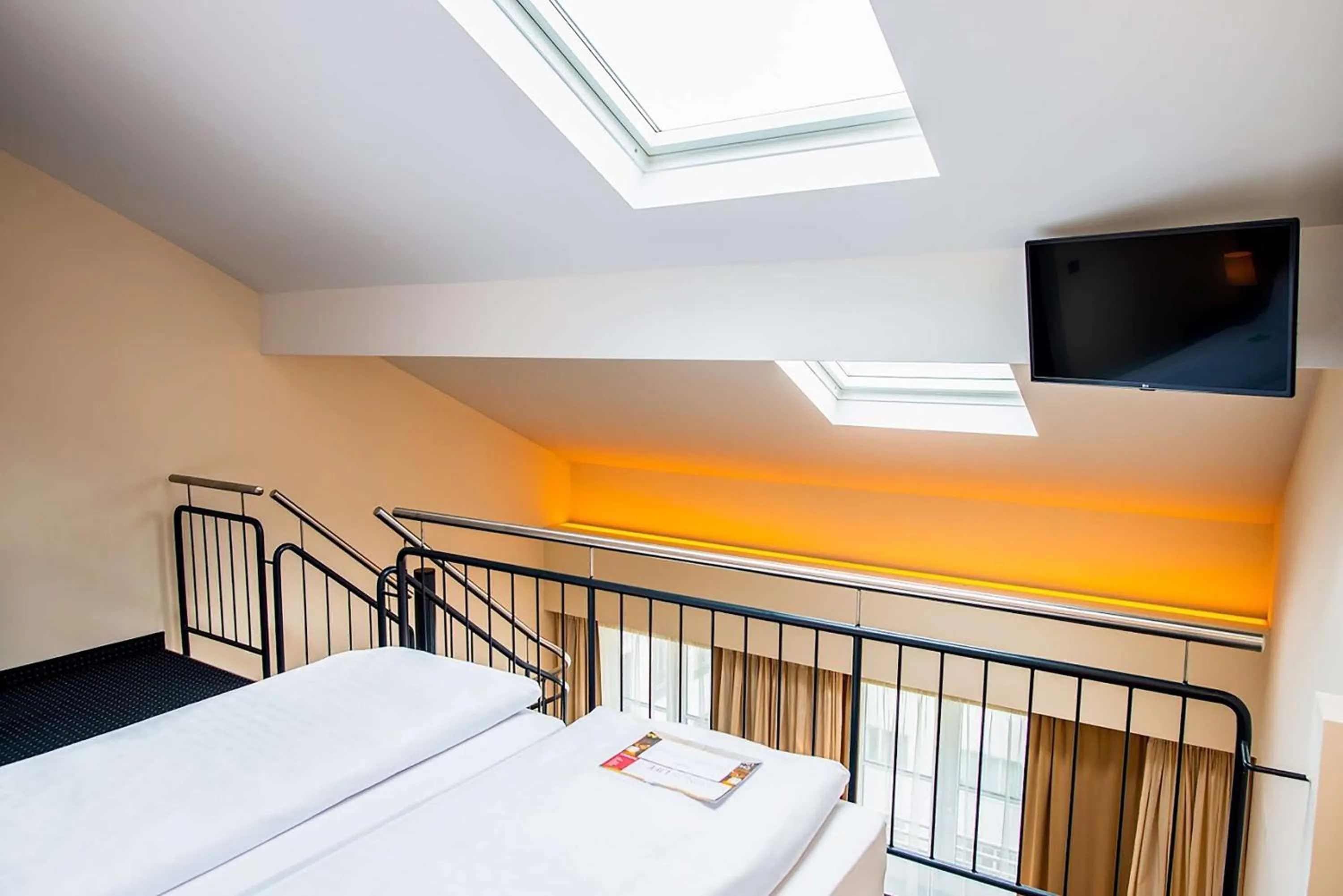 Bedroom in Flemings Hotel München-City