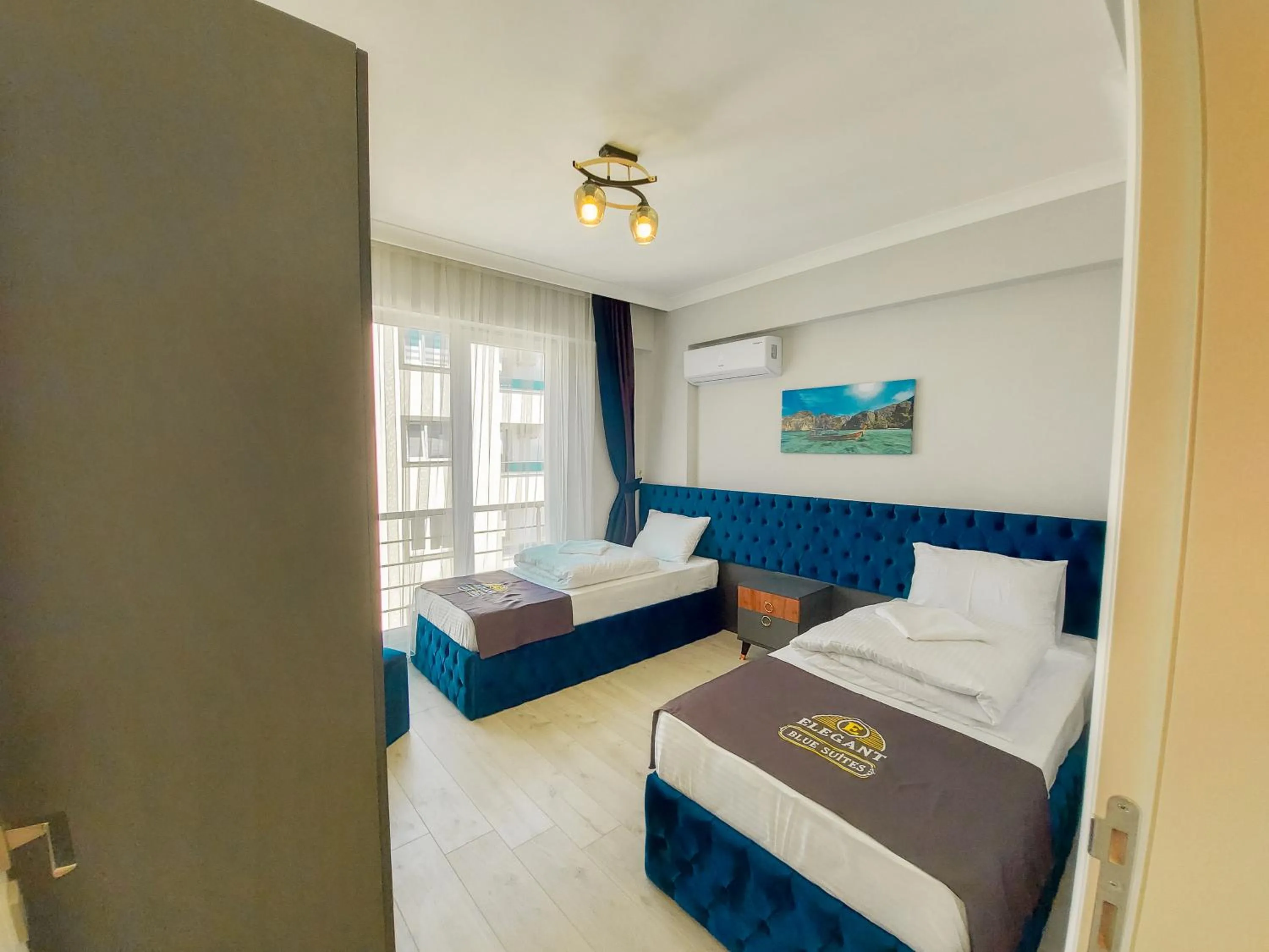 Family in ELEGANT BLUE SUİTES