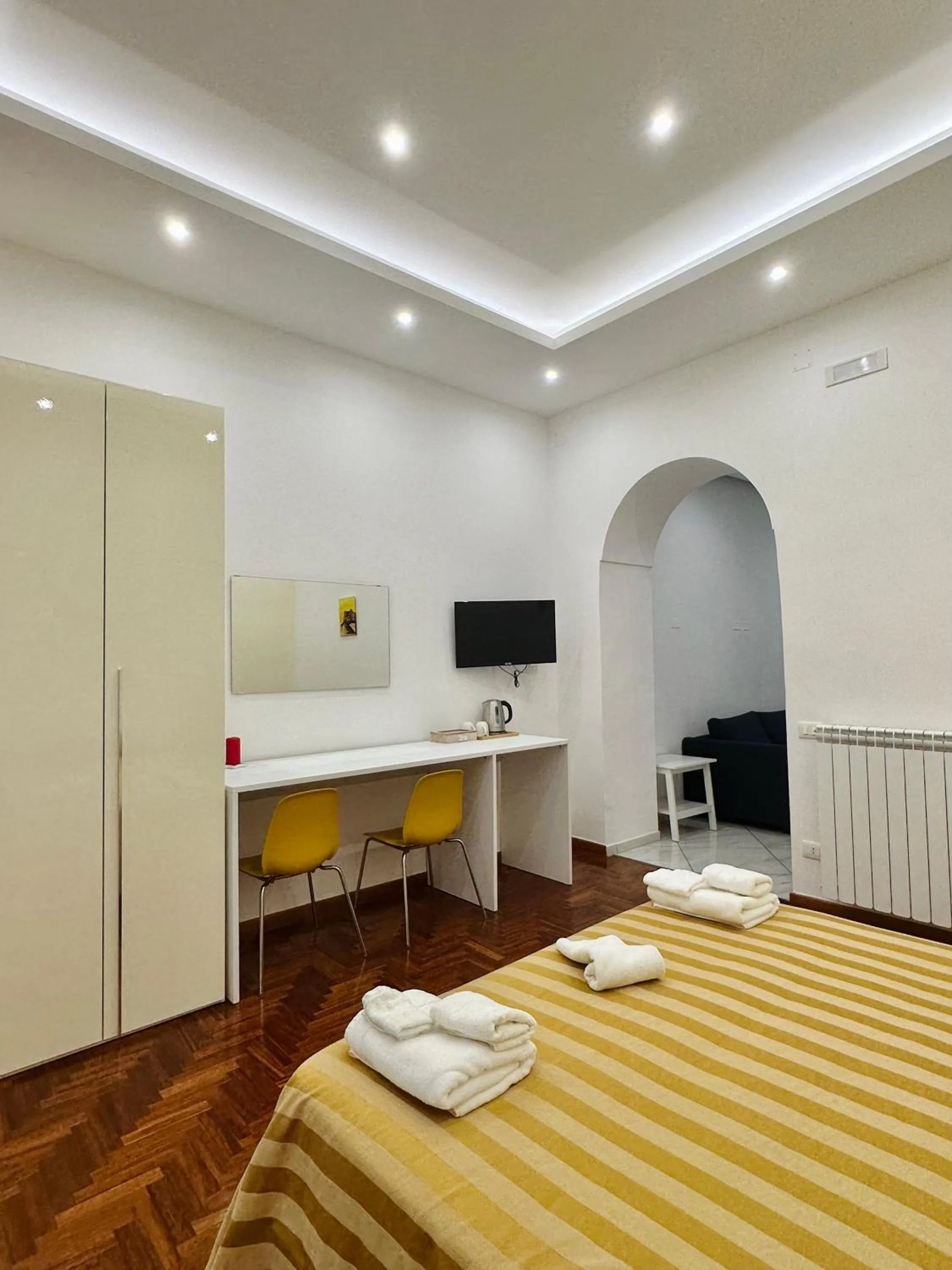 Bed in SoLuMa' Chiaja Rooms