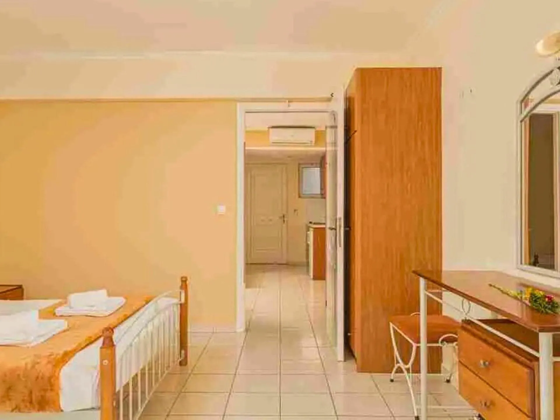 Bed in Manousis ApartHotel